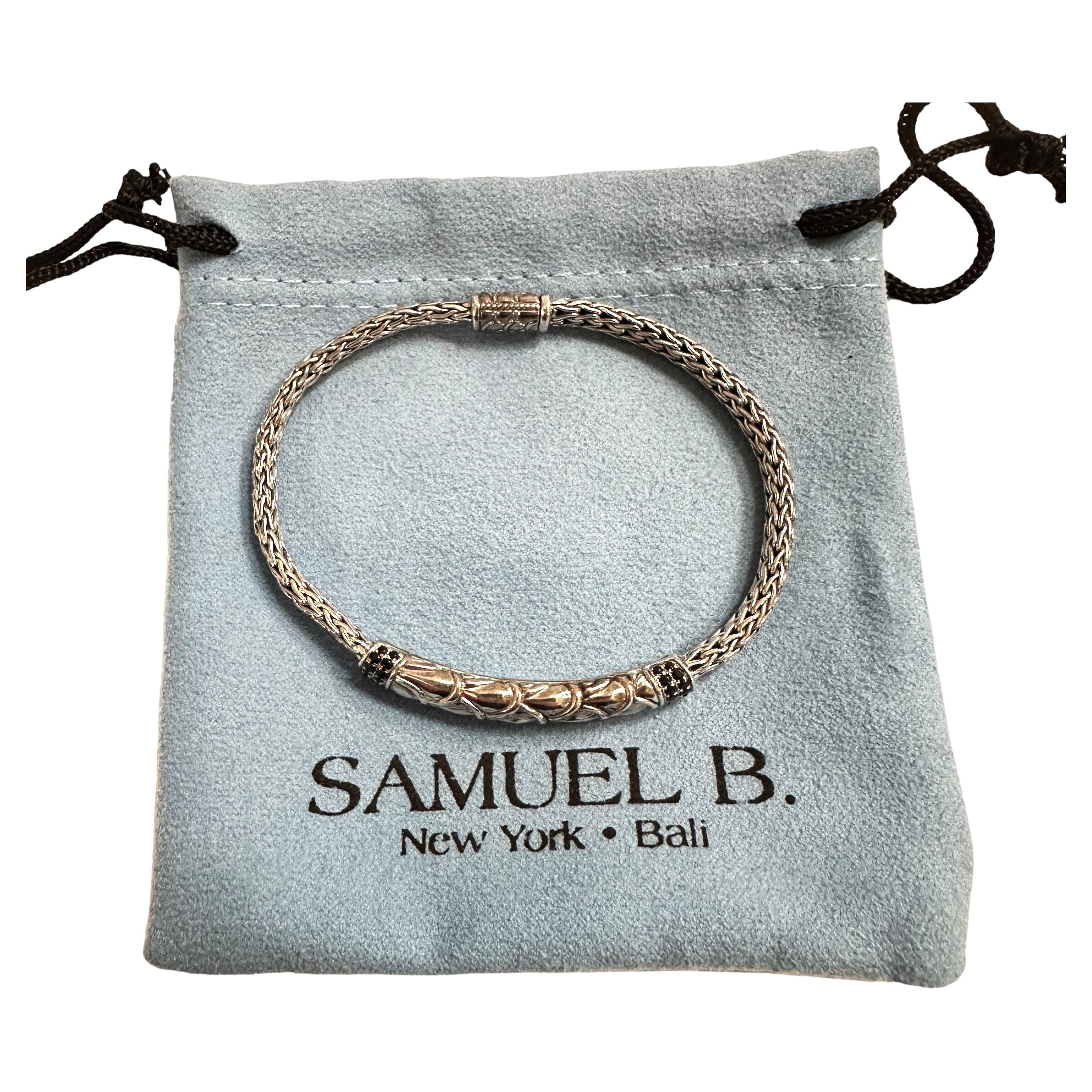 This is a pre-owned Samuel B, New York Sterling Silver Bracelet.  It comes with a blue duster bag.  The bracelet is 7.5 inches long and the mesh chain is 4.8 mm wide.  It's in excellent condition. This bracelet will surely get noticed.  It's truly