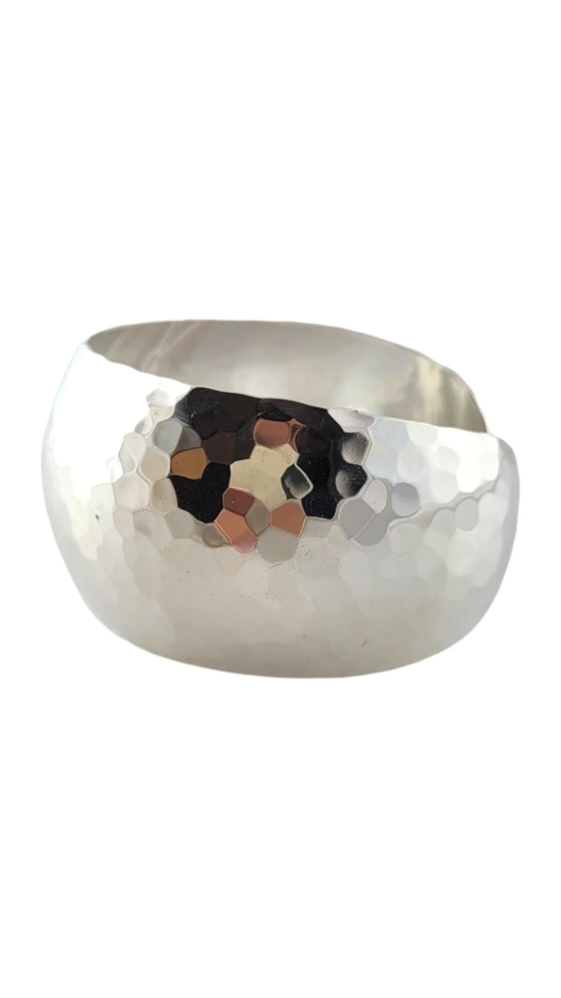 Samuel Benham Hammered Sterling Silver Wide Cuff Bracelet

This gorgeous, hammered sterling silver cuff bracelet was meticulously crafted by designer Samuel Benson!

Size: 6.5