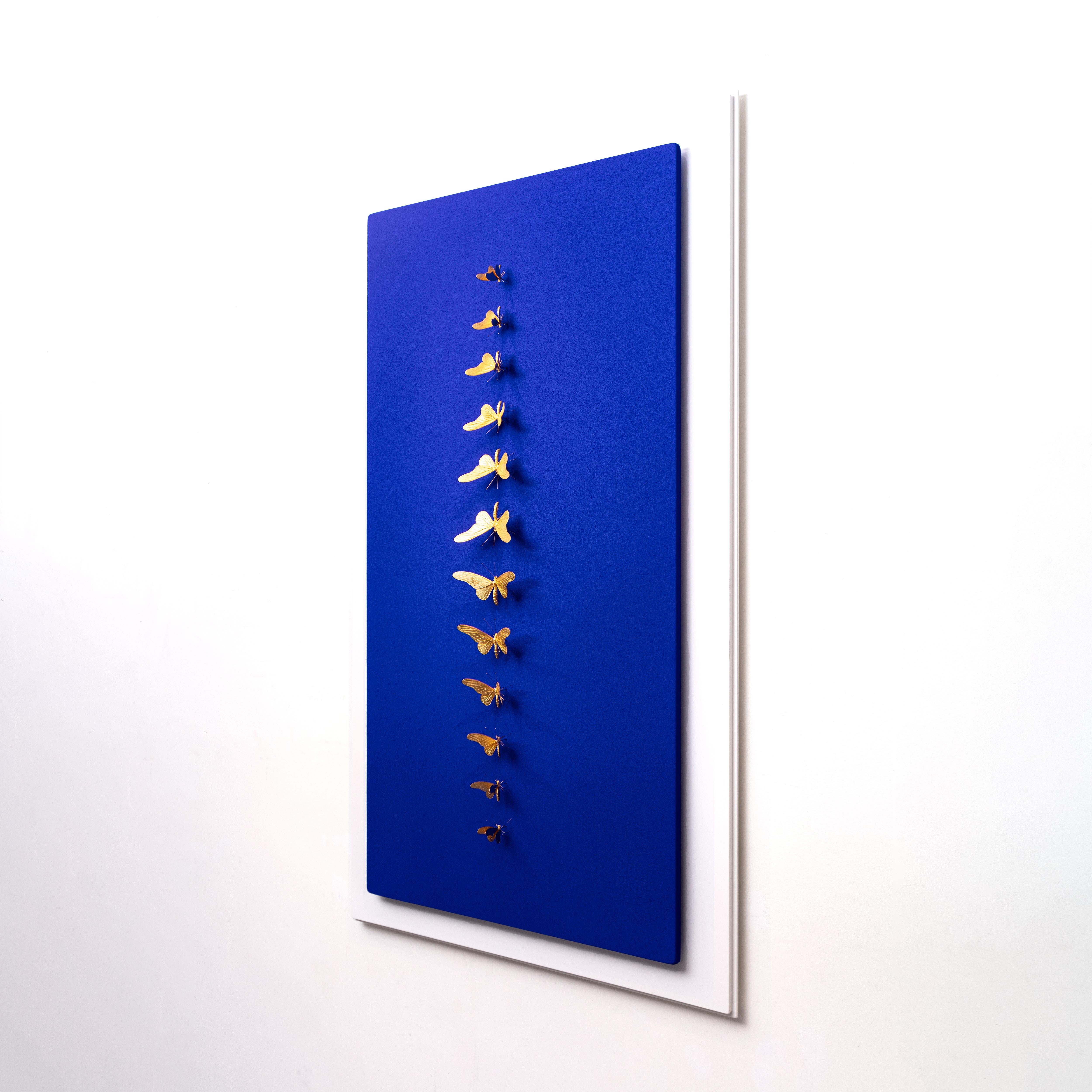 Metamorphosis Redux Blue
Pigments and gold butterflies on canvas and wood.

As a self-taught artist with a medical background in surgery, bio-engineering and design, he stretches the limits of technical as well as aesthetic potential, applying the