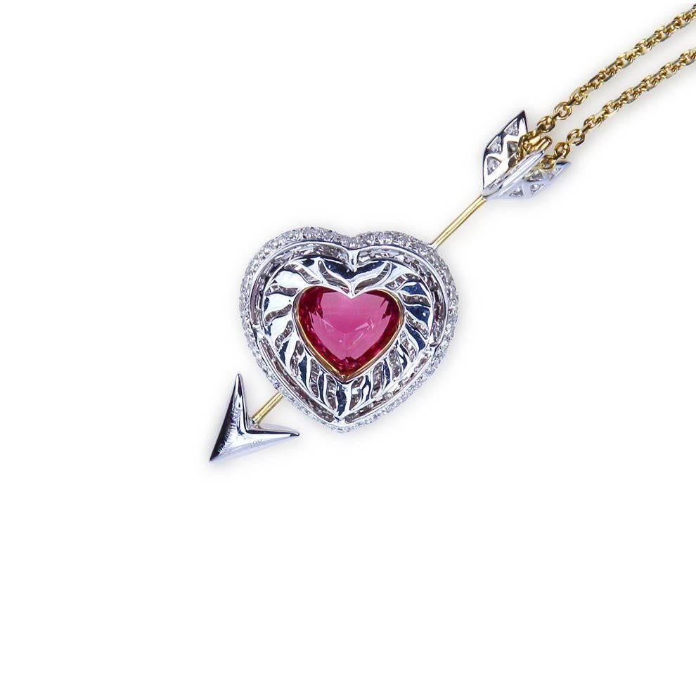 A “Samuel Getz” 18 Karat Yellow and White Gold “Heart & Arrow” Pendant Featuring A Heart Shape Hot Pink Spinel, 4.20 Carat [9.28 x 10.85 x 6.47 mm] [Burma] and 162 Round Brilliant Diamonds, 3.91 Carats of F Color and VVS1 – VS1 Clarity. The