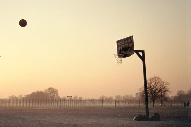 Basketball 1, Clapham - Samuel Hicks, Sports, Portrait, Sunrise, London - Contemporary Photograph by Samuel Hicks