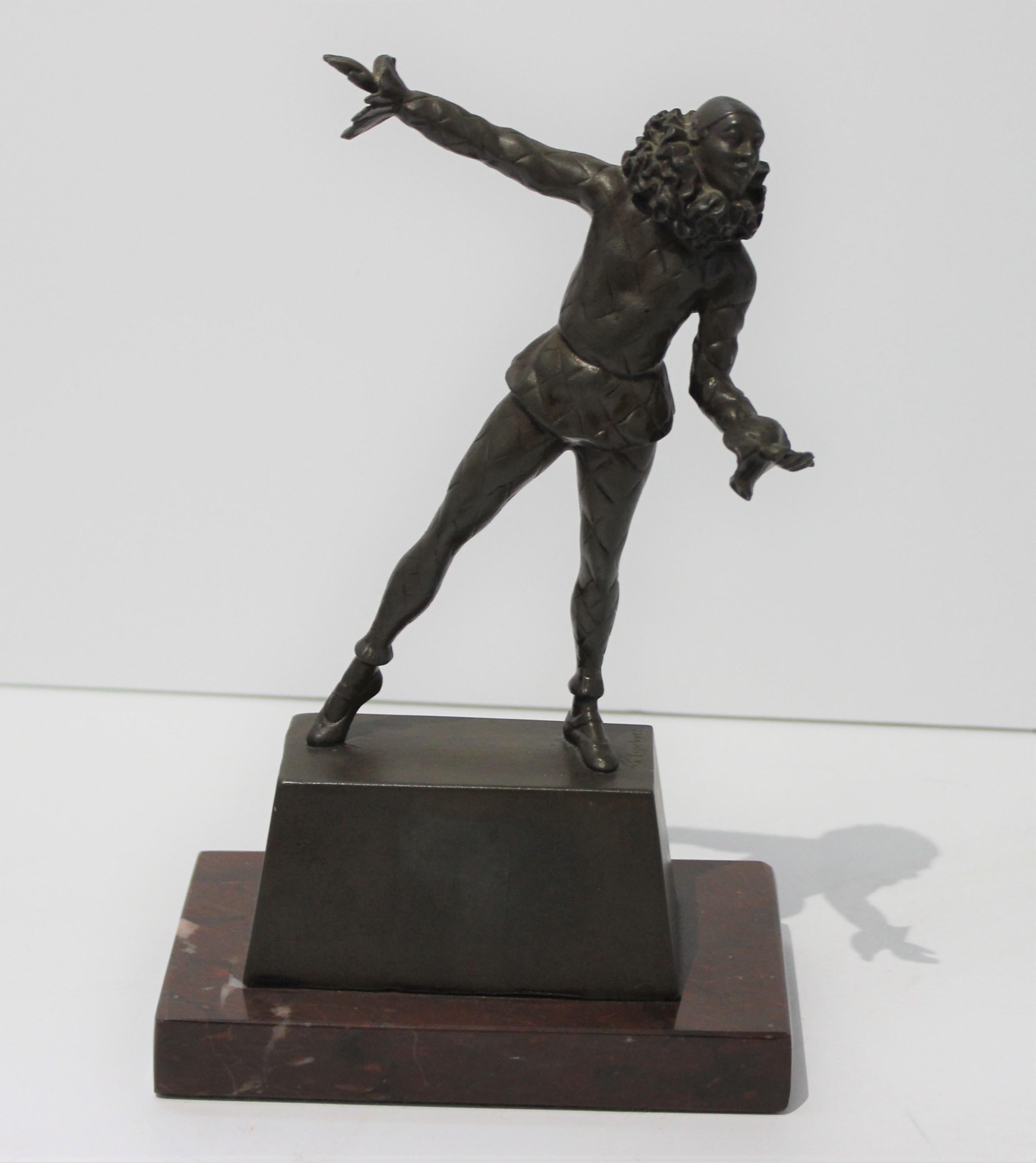 Bronze sculpture of a Harlequin on a rouge marble base - by Samuel Lipchytz (1880-1943) France.

About the Artist:
Samuel LIPSCHITZ (born Salomon Lipszyc)
PABIANITZ (POLAND) 1880 – DEPORTED TO AUSCHWITZ 1943
Samuel Lipschitz received a