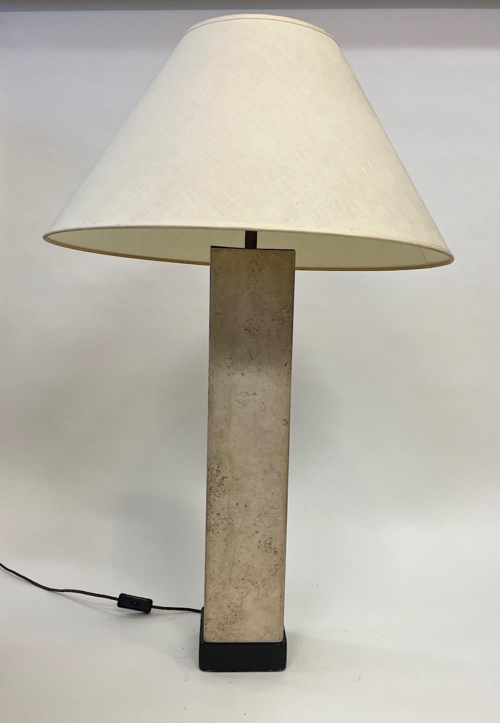 A Samuel Marx table Lamp from the Alfred Koolish Residence, Bel Air, California
Travertine,Patinated Metal and a Fabric Shade.
An oversized lamp similar to the Floor lamps pictured in Ultramodern Samuel Marx , Liz O' Brien 
Pg 175
