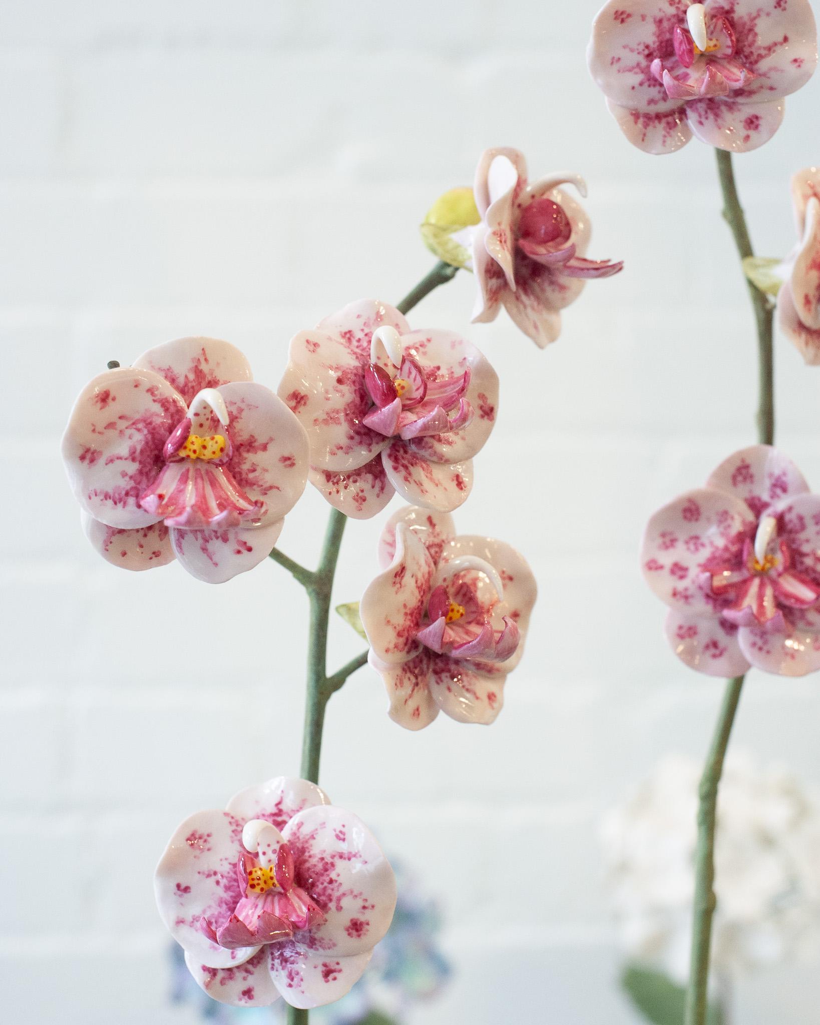 Enhance your table with this delicate porcelain and bronze orchid by French artist Samuel Mazy, exclusive to Maison Nurita in Canada. Mazy has been working as a ceramist for nearly 20 years in Paris. He sculpts porcelain flowers to create poetic