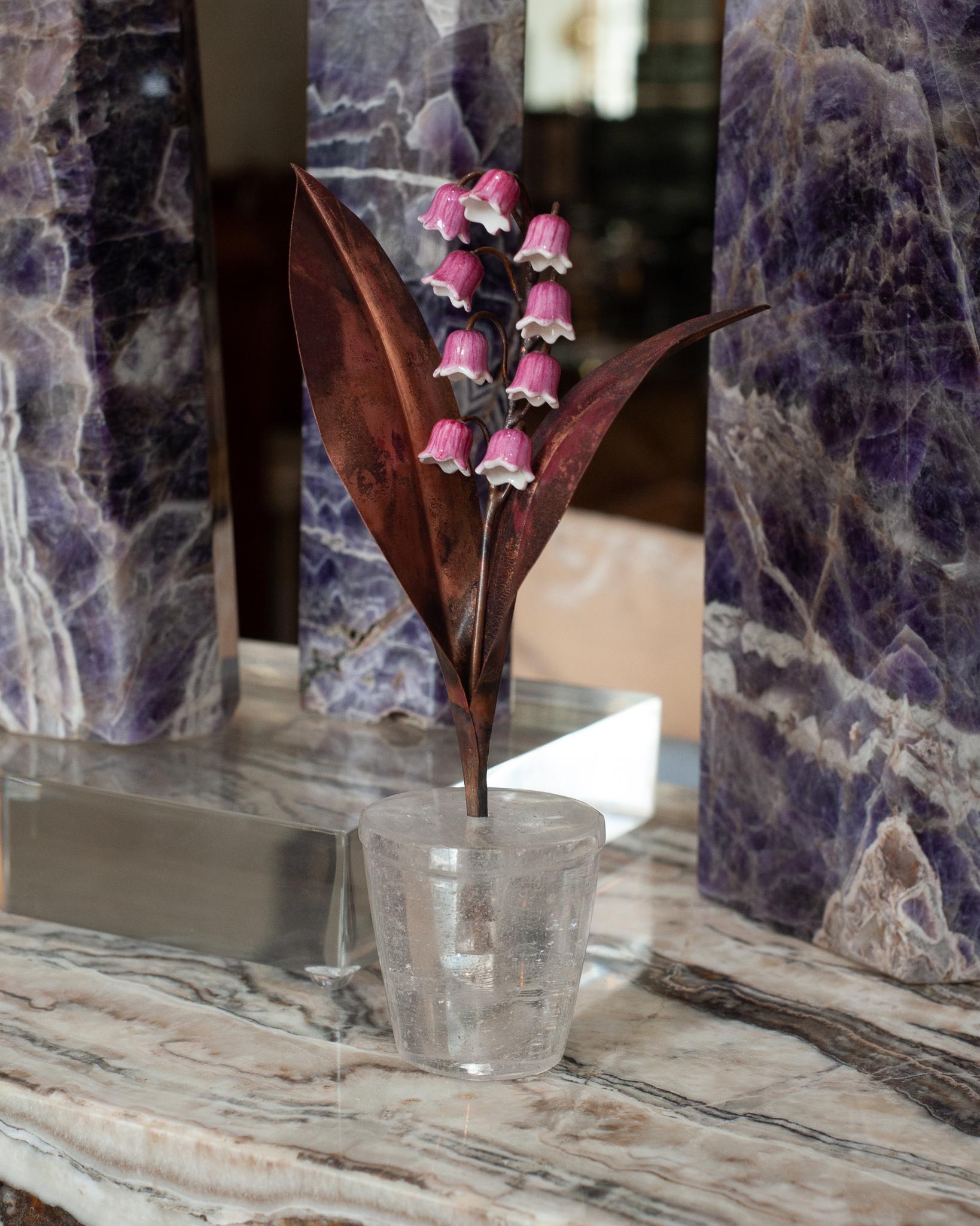 Enhance your table with these delicate porcelain flowers by French artist Samuel Mazy, in collaboration with Maison Nurita. This Lily of the Valley is handmade in biscuit porcelain, glazed in a custom pink for Maison Nurita, with patinated copper