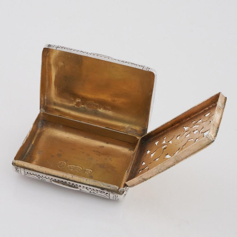 Heading : Samuel Pemberton novelty purse vinaigrette
Date : Hallmarked in Birmingham in 1830 for Samuel Pemberton
Period : William IV
Origin : Birmingham, England
Decoration : In the form of a purse with chased foliate design. Parcel gilt interior