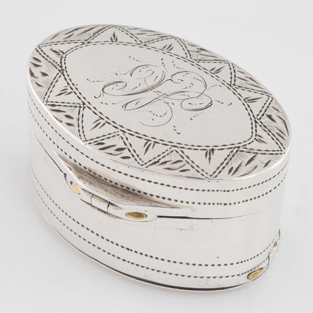 Heading : Sterling Silver Nutmeg Grater
Date : Hallmarked in Birmingham 1800 For Samuel Pemberton
Period : George II
Origin : Birmingmam England
Decoration : Geometric engravd cover with monogram FC
Size :  Height 2.0cm, ovoid base 3.3 x