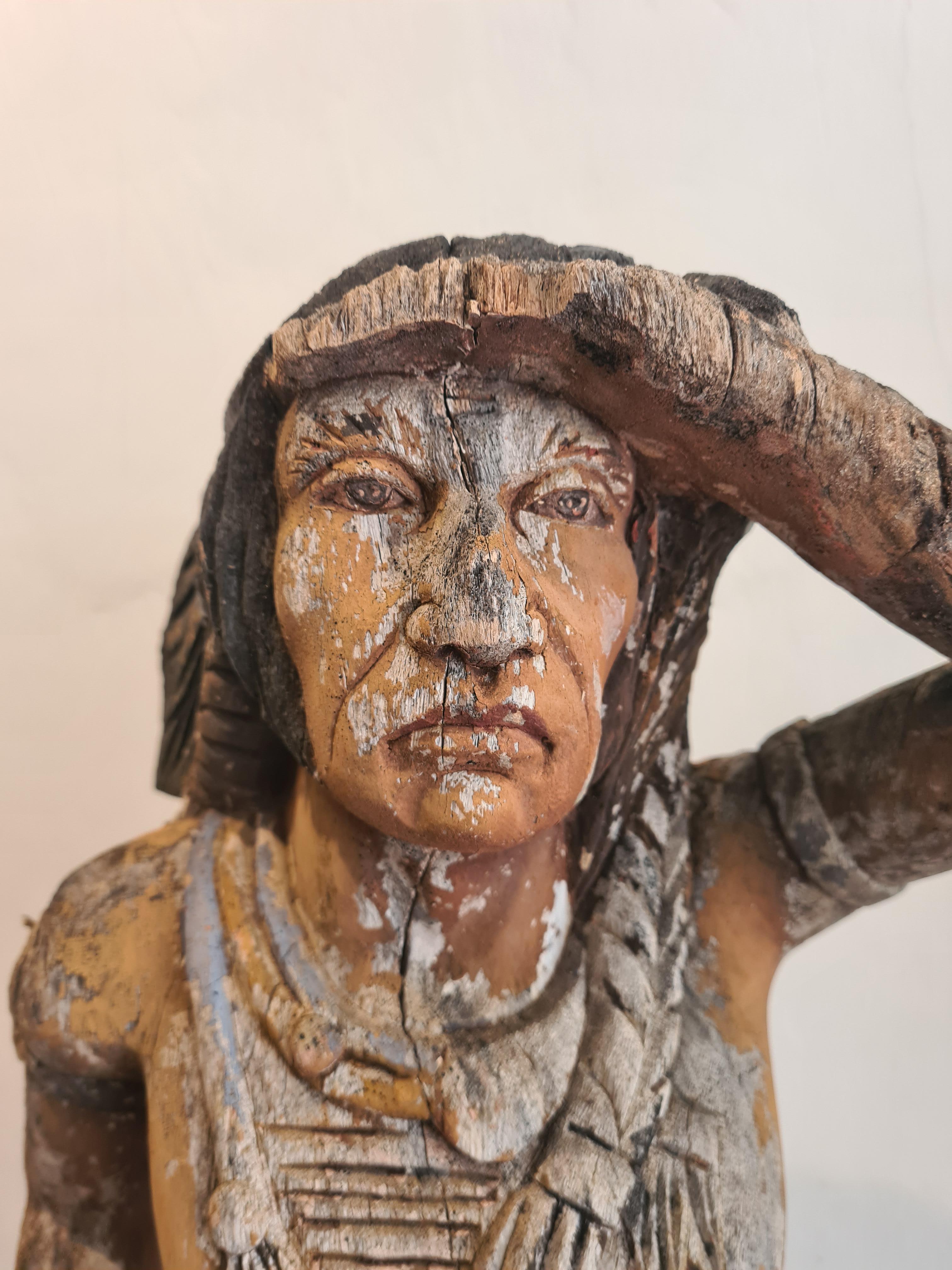A 20th Century wood carved male figure, a 'Cigar Store Indian' with original polychrome decoration.

A now controversial subject, but none the less charming rendition, of a native North American man originally probably used as an advertising figure.