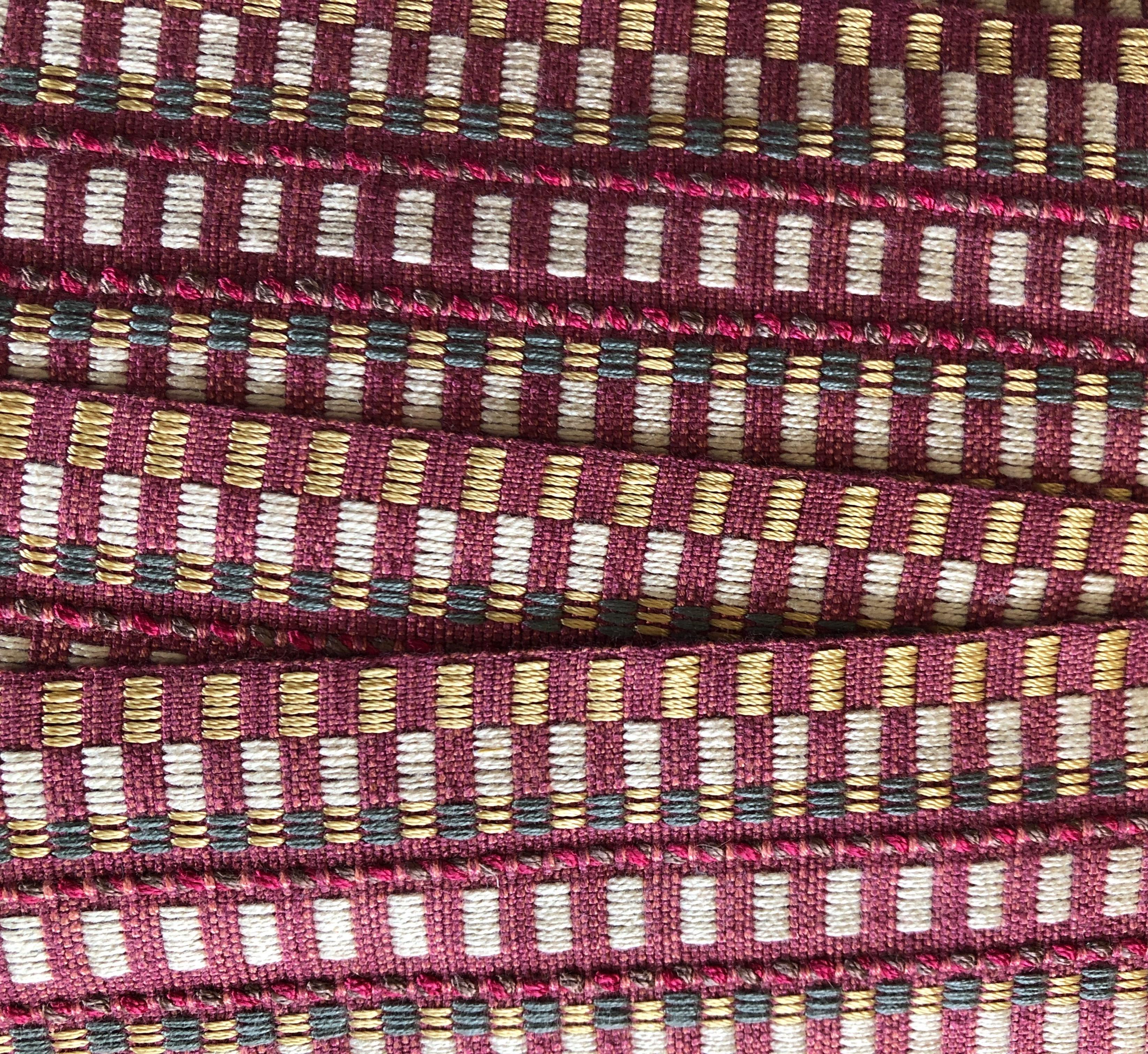 Samuel & Sons red and yellow woven border
Color: Coral/cream/gold
Ideal for pillows, upholstery and curtains.
Size: 15 yards x 2.5
