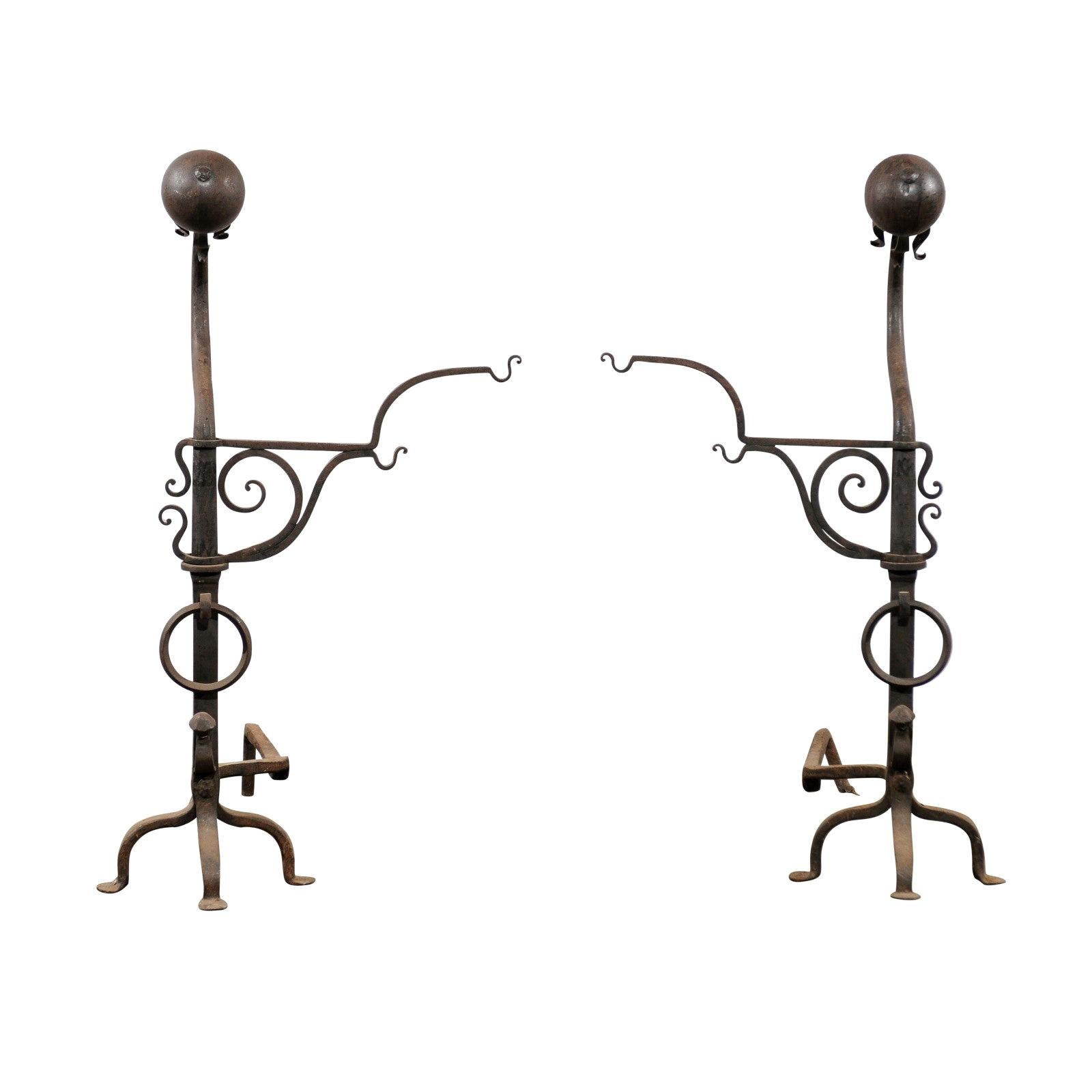 Samuel Yellin Style Pair of 20th Century Jumbo Iron Andirons with Cooking Arms For Sale