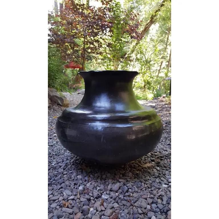 Large-scale Native American black ware or black on black pottery vessel. Made at the San Ildefonso Pueblo, circa 1890-1910. Santa Fe County, New Mexico. This piece was made before pieces were commonly signed. Created as a utilitarian vessel, it was