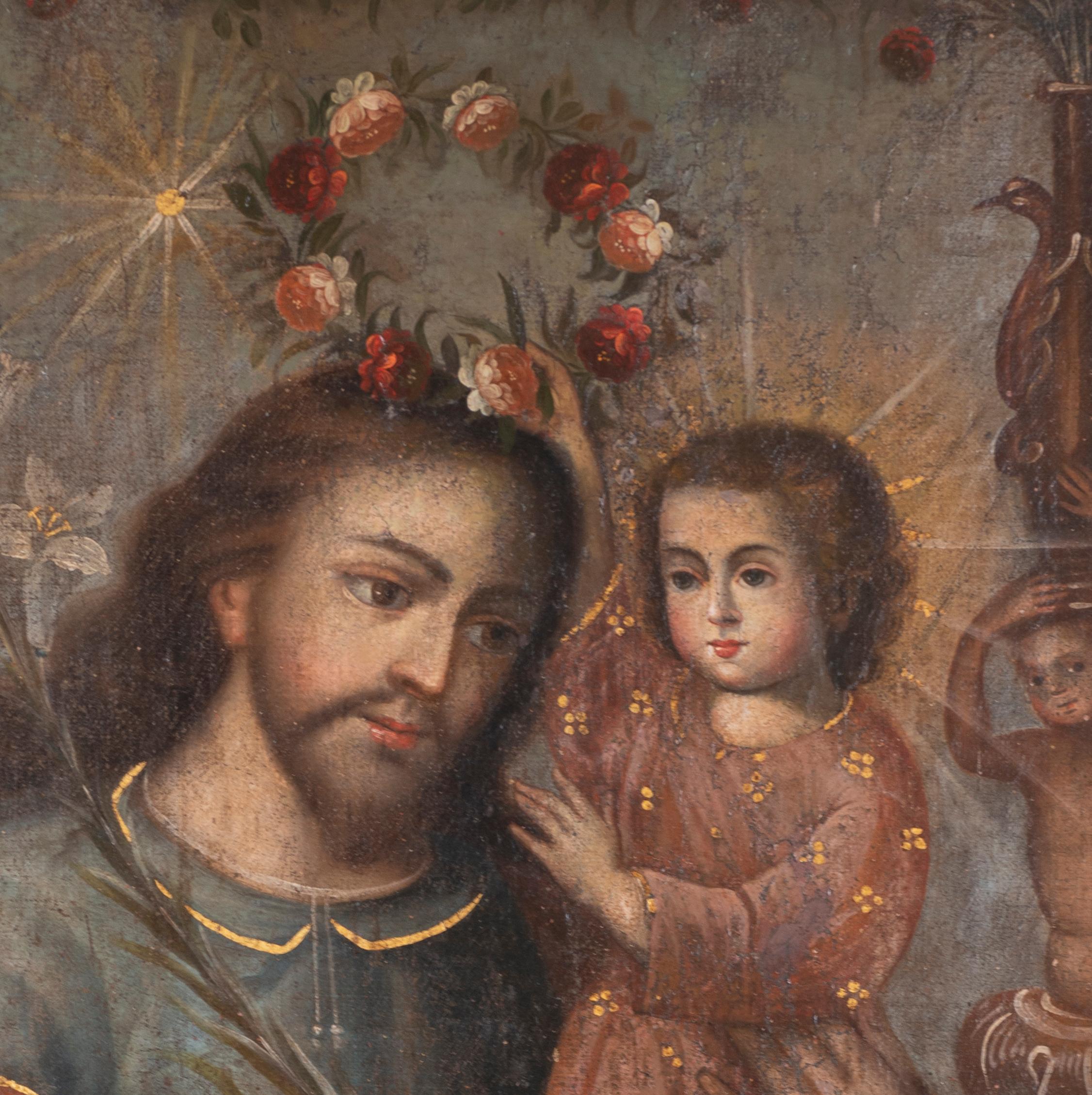 This Cuzqueño painting depicts Saint Joseph with the Christ child. The framed dimensions are 35 x 29 inches.
