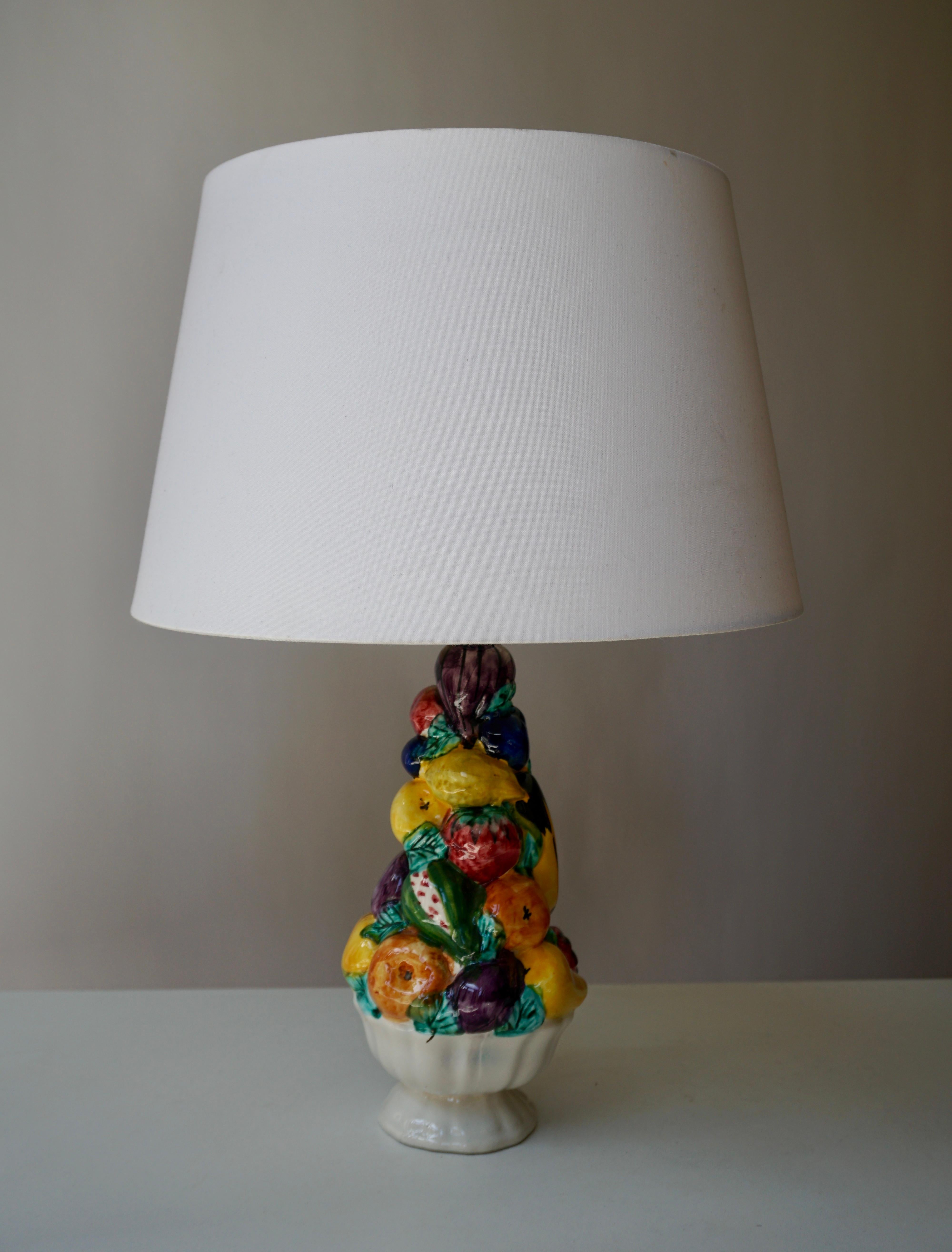 Vintage, hand thrown Italian San Marino pottery table lamp, circa 1960s. San Marino is a tiny independent republic within Italy similar to the Vatican. This is a piece with many of the hallmarks of great 1960s Italian pottery, lava glaze,