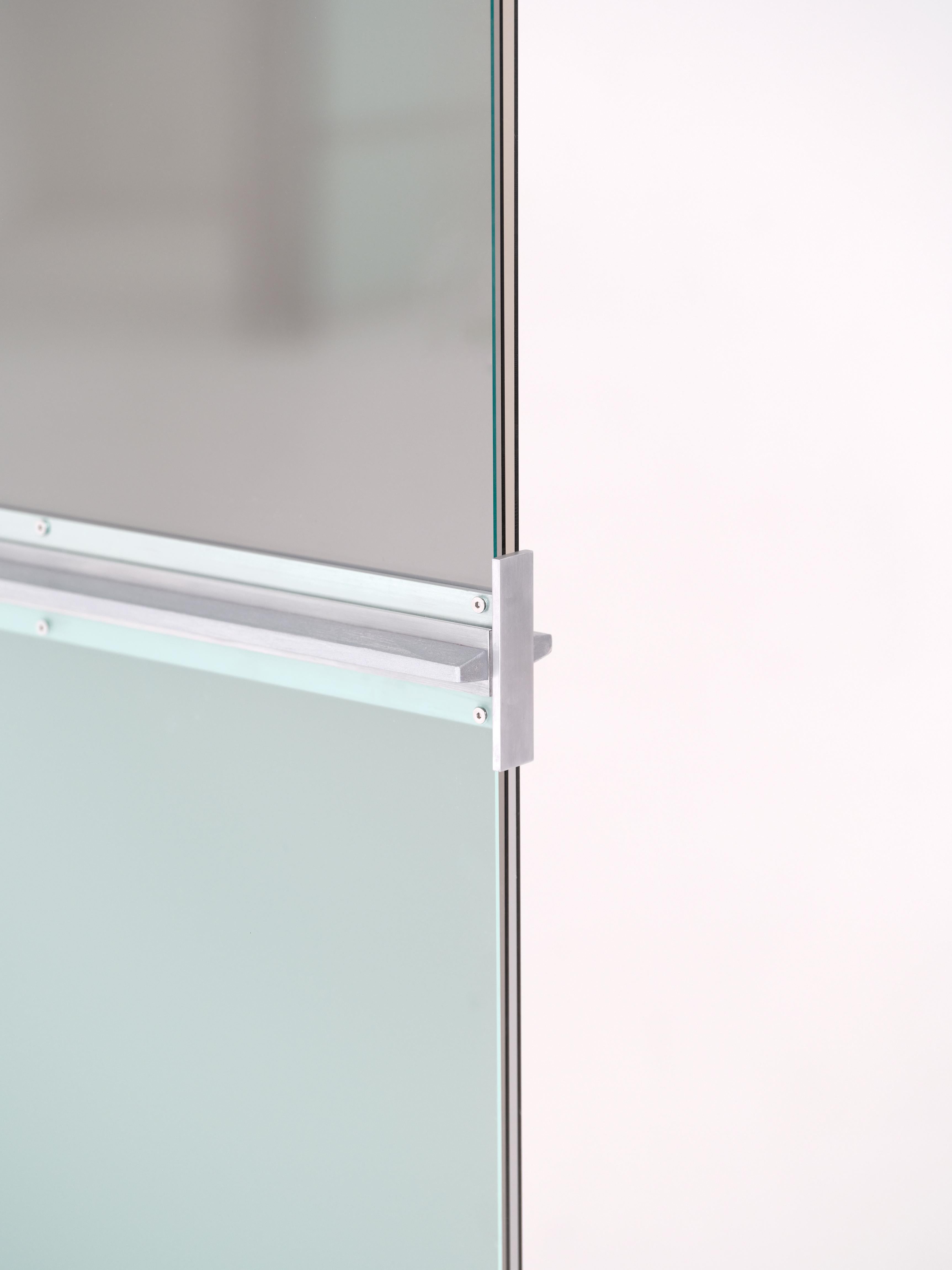 The room screen attaches to the column. The sandwich of panel colours are interchangeable to play with translucency and indirectly illuminate the room, possibilities can include a smoky effect inspired by common glass objects of 90s China. Through