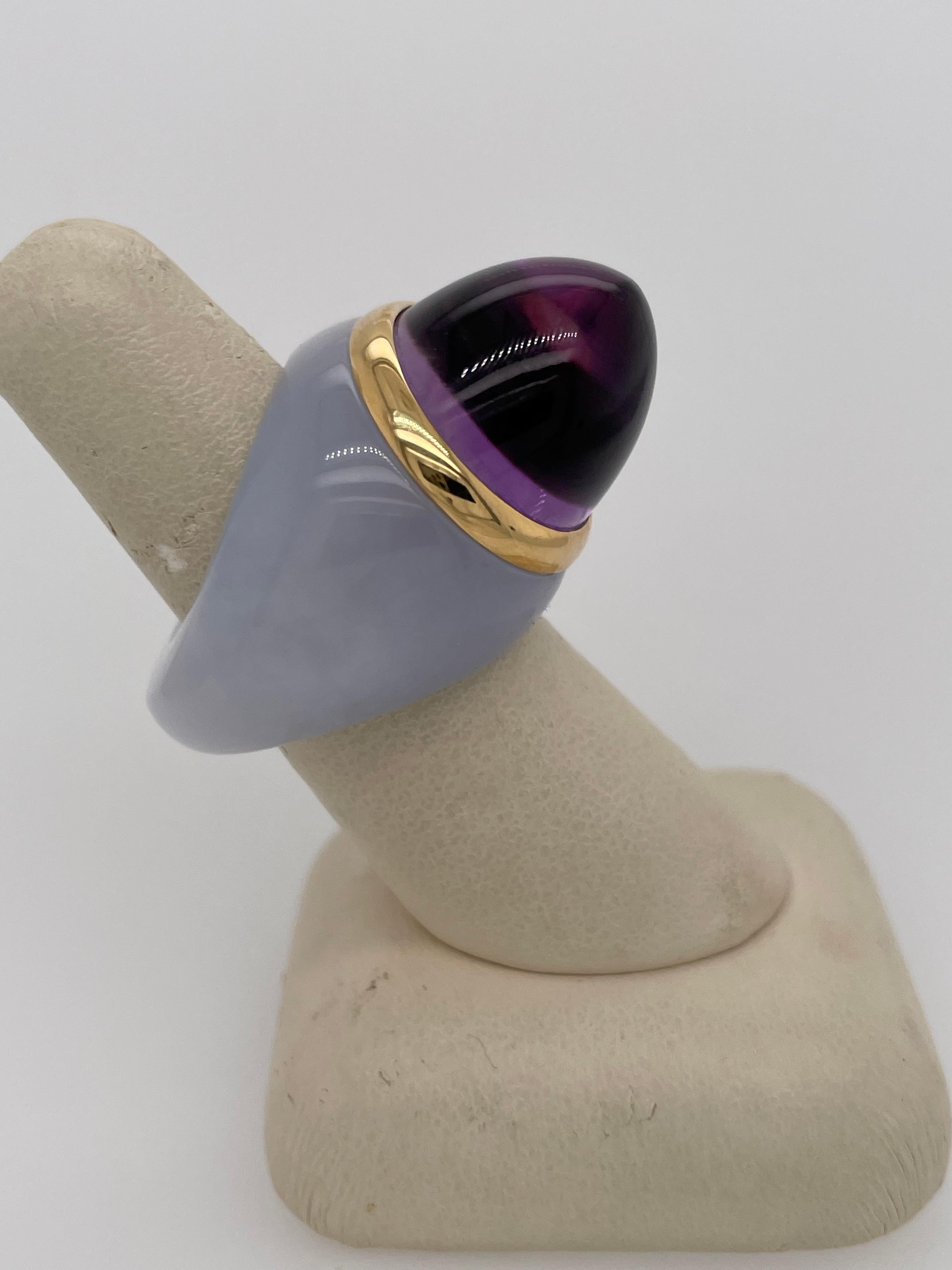 A work of art and one of a kind piece from the famous house of Sanilitro in Milano.  This stunning ring contains 3.59 grams of yellow gold, 67.05 Carats of Chalcedony and 29.20 Amethyst.  This one of a kind ring is a 6.5 and cannot be sized.  