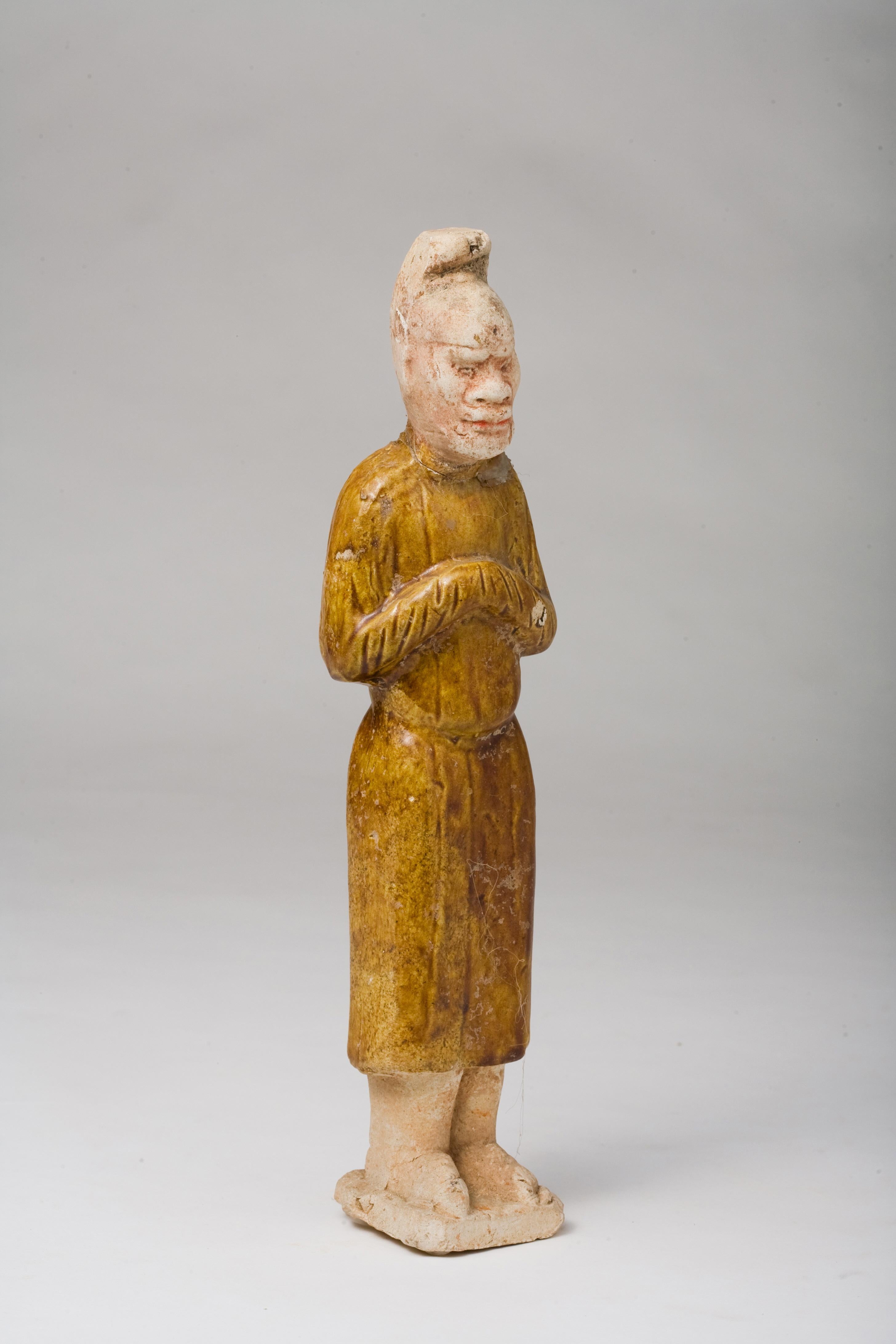 Chinese Sancai-Glazed Pottery Figure Of A Foreign Official, Tang Dynasty For Sale