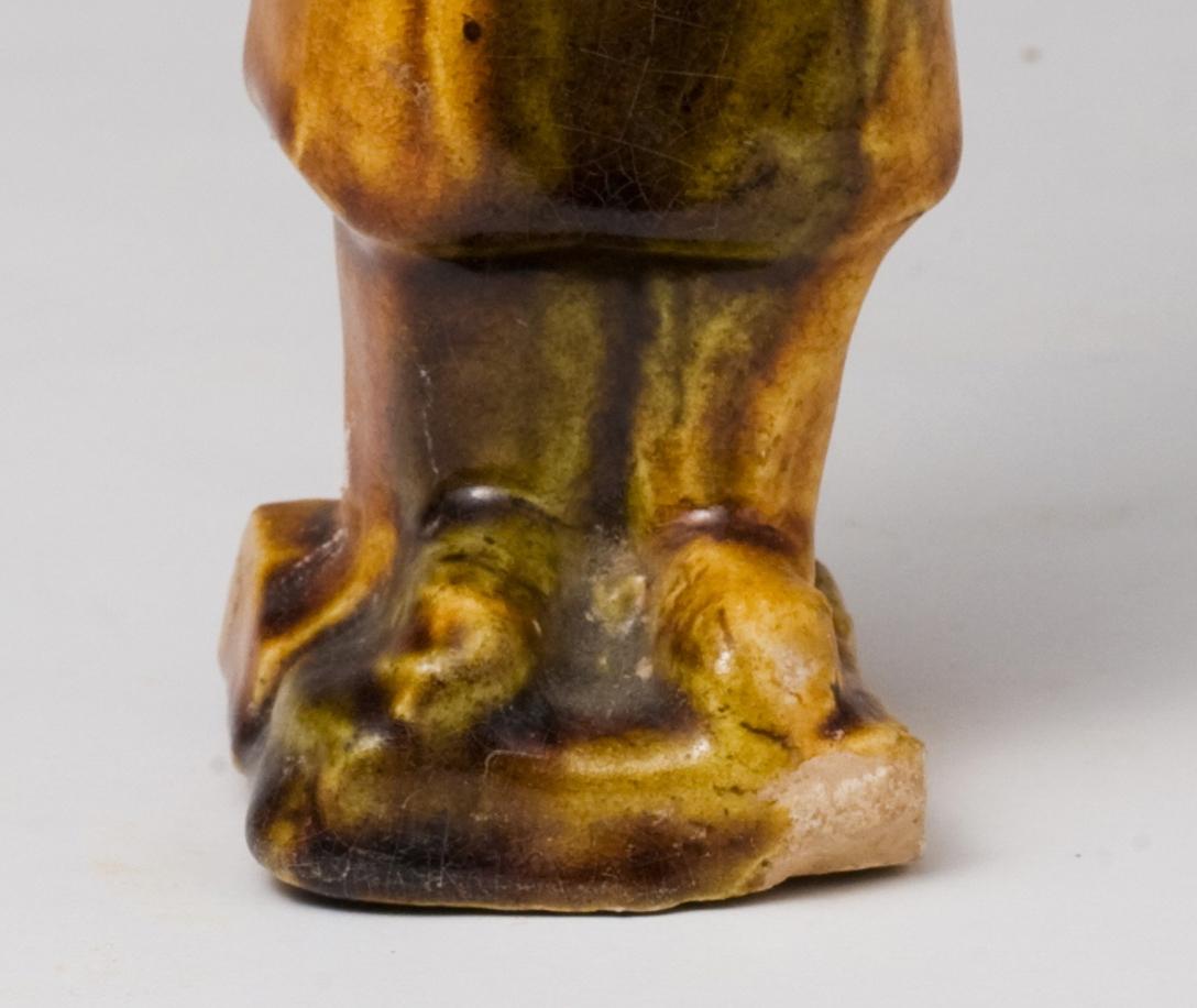 Earthenware Sancai-Glazed Pottery Figure Of An Official, Tang Dynasty For Sale