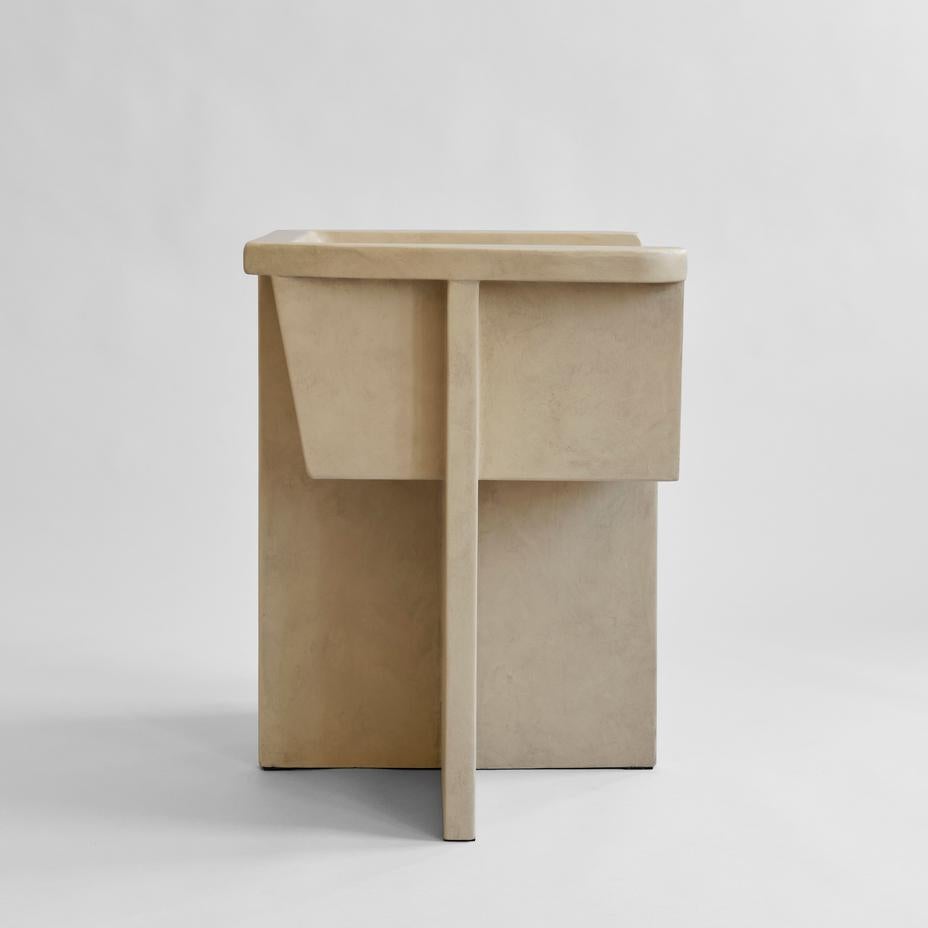 Sand Brutus dining chair by 101 Copenhagen
Designed by Kristian Sofus Hansen & Tommy Hyldahl
Dimensions: L68 / W50 /H68 CM
Seat height: 44 CM / Seat depth: 37 CM
Backrest height: 24 CM

Materials: Fiber concrete

Inspired by the Brutalist