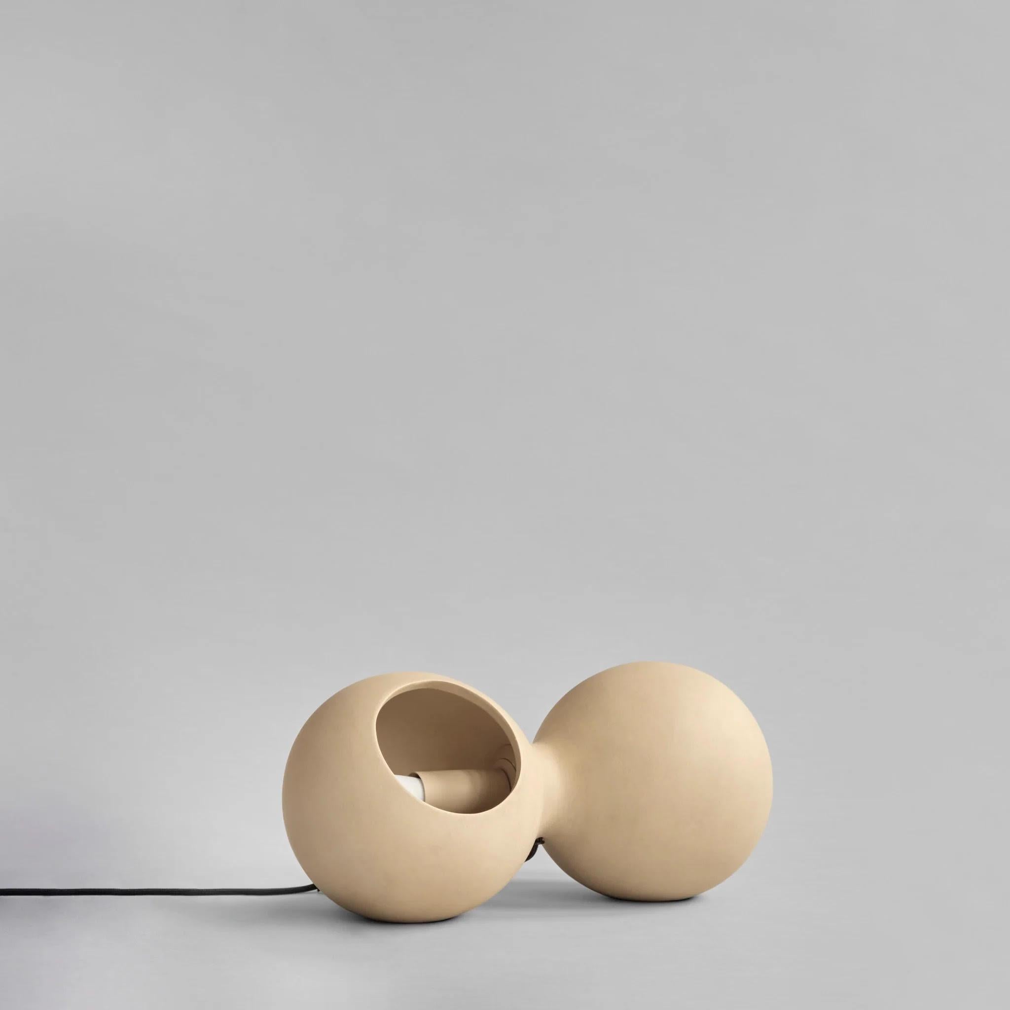 Sand-coloured ceramic wall lamp, contemporary work.

Wall lamp or table lamp in the style of the 1970s in sand-coloured ceramic, contemporary work contemporary handmade work.
As this is a hand-glazed natural product, colours may vary