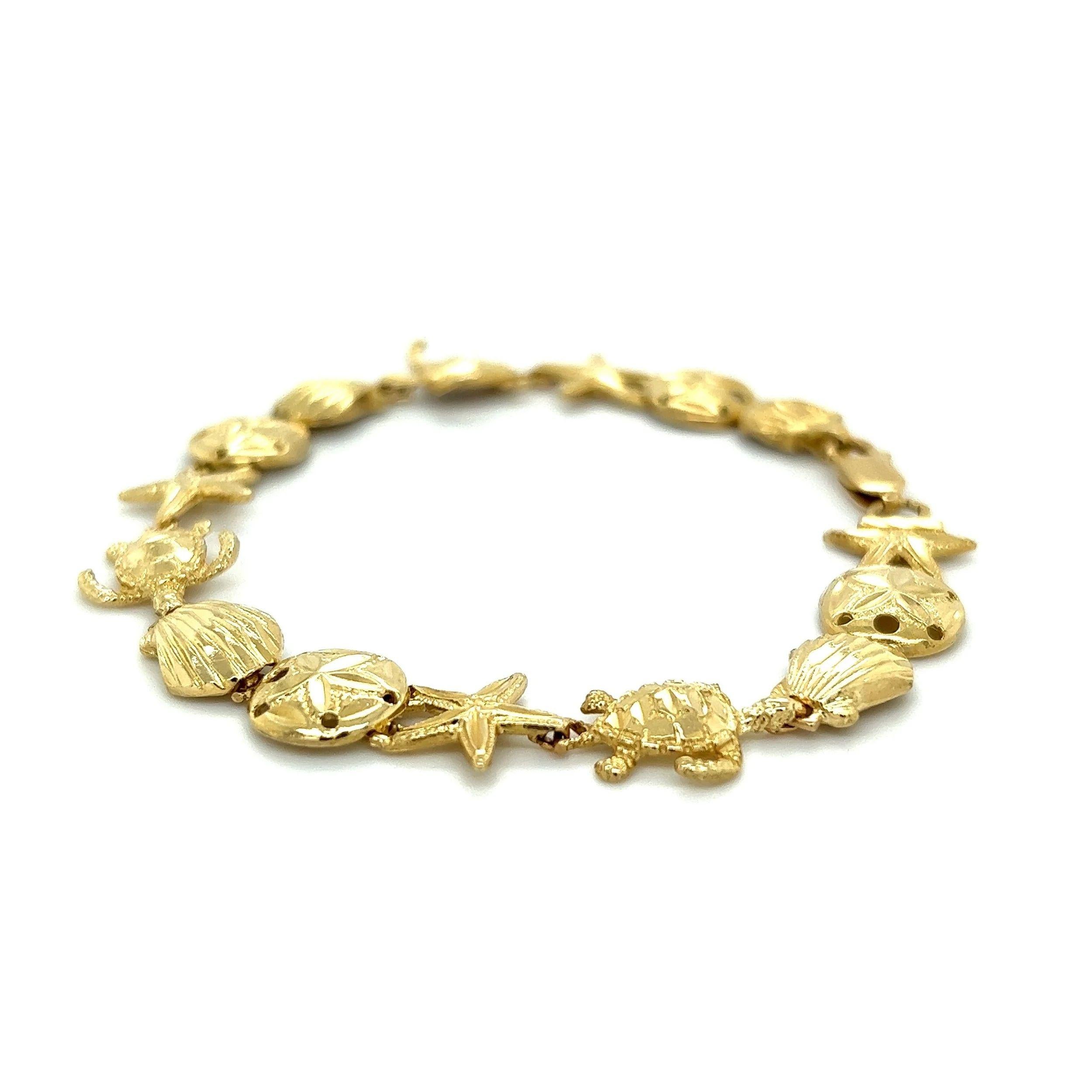 Sand Dollar, Starfish, Seashell, Clam and Turtle Sea Life Gold Link Bracelet In Excellent Condition For Sale In Montreal, QC