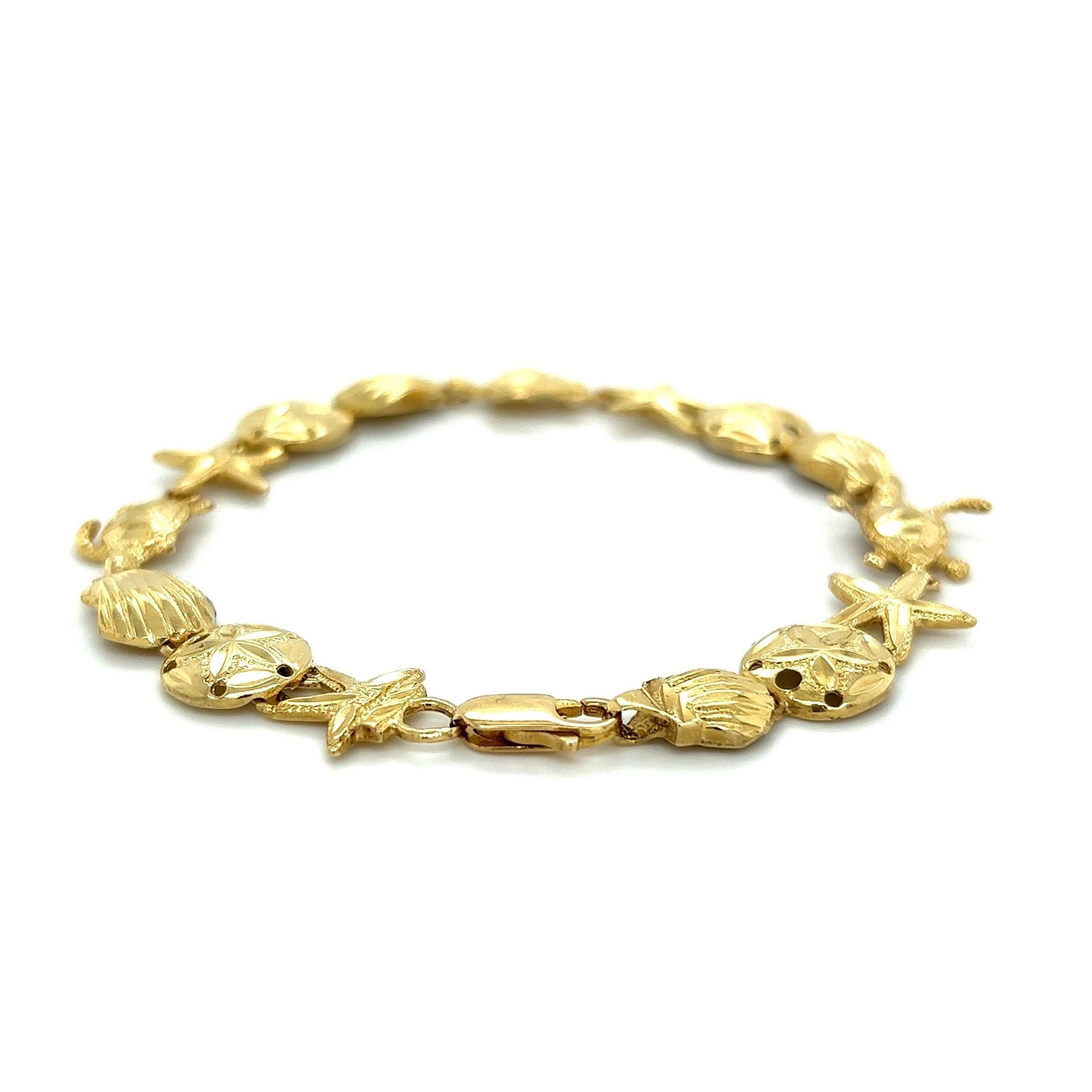 Goldgliederarmband aus Sand Dollar, Seesternen, Muscheln, Muscheln und Schildkröten Meeresleben im Zustand „Hervorragend“ im Angebot in Montreal, QC