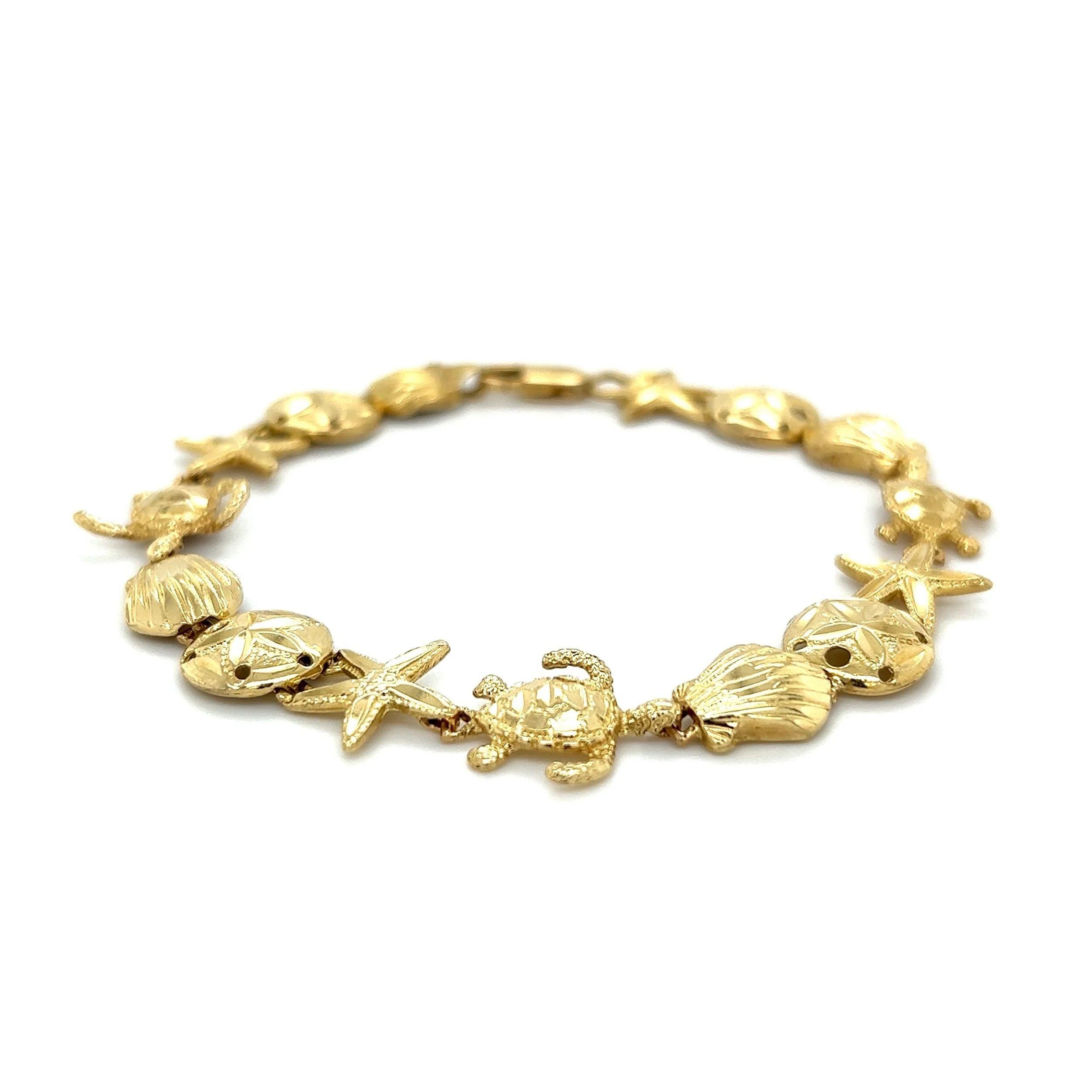 Goldgliederarmband aus Sand Dollar, Seesternen, Muscheln, Muscheln und Schildkröten Meeresleben Damen im Angebot