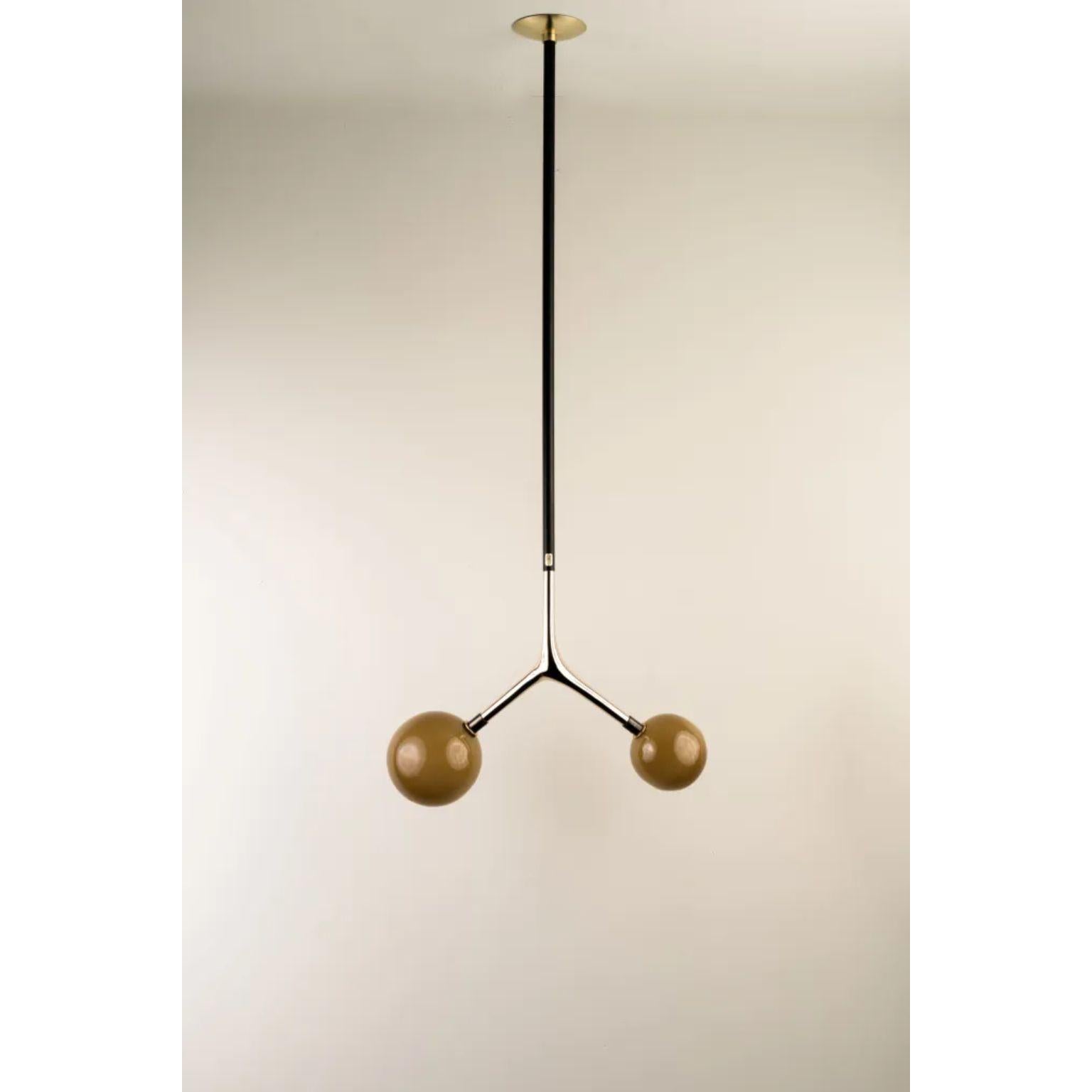 Sand Dupla Pendant Lamp by Isabel Moncada
Dimensions: W 45 x D 20 x H 125 cm.
Materials: Brass, cast bronze and blown glass.

Dupla hangs from the ceiling just like a branch with its fruits. The customizable length options allow play with scale and