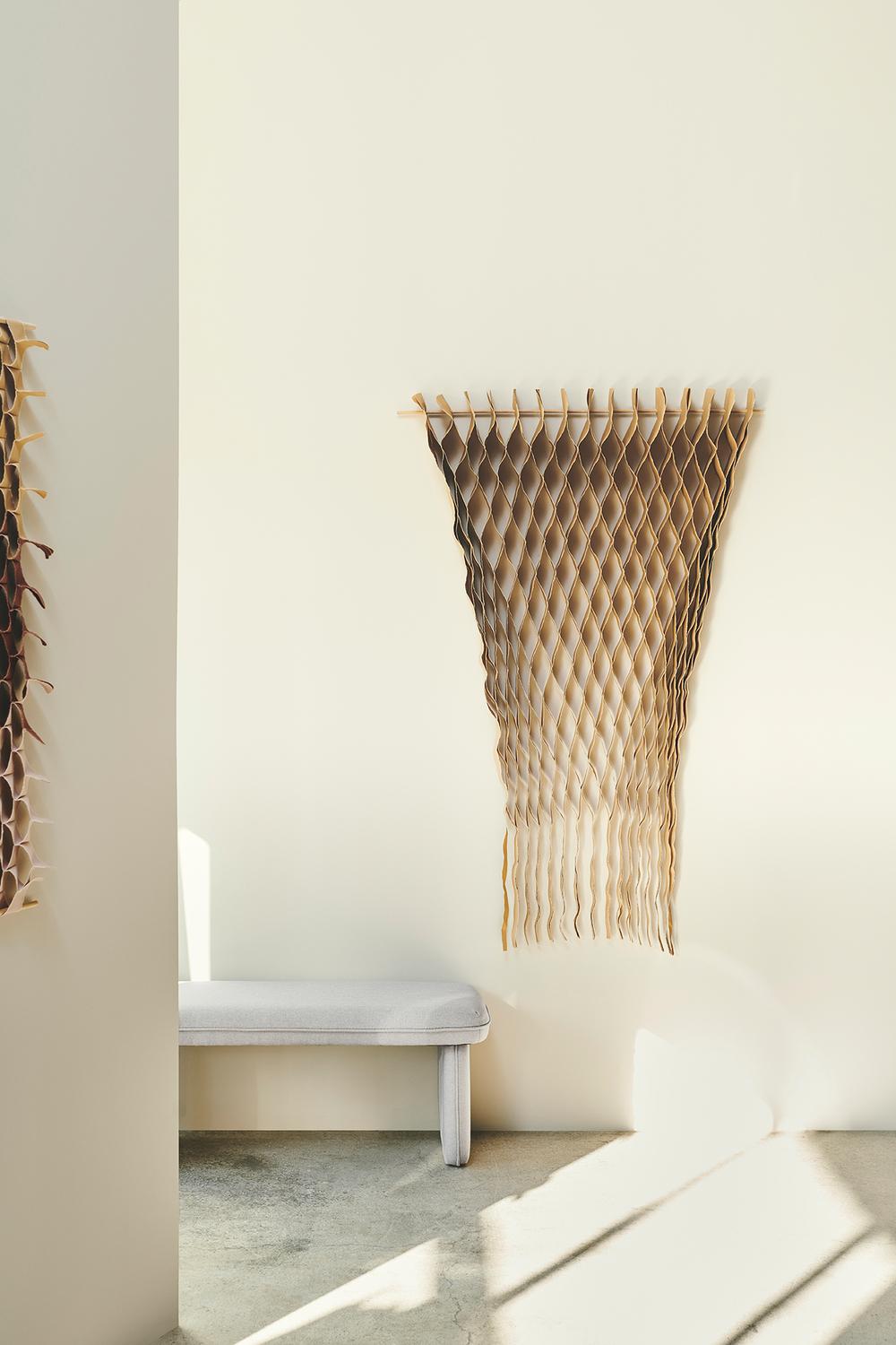 Sand Flow Wall Art by Applicata
Dimensions: D 10 x W 100 x H 150 cm
Materials: Textile.

Available in blue, brown, rose, and sand colors.

The FLOW Collection is a series of handmade textile art with roots in haute couture's flowing design