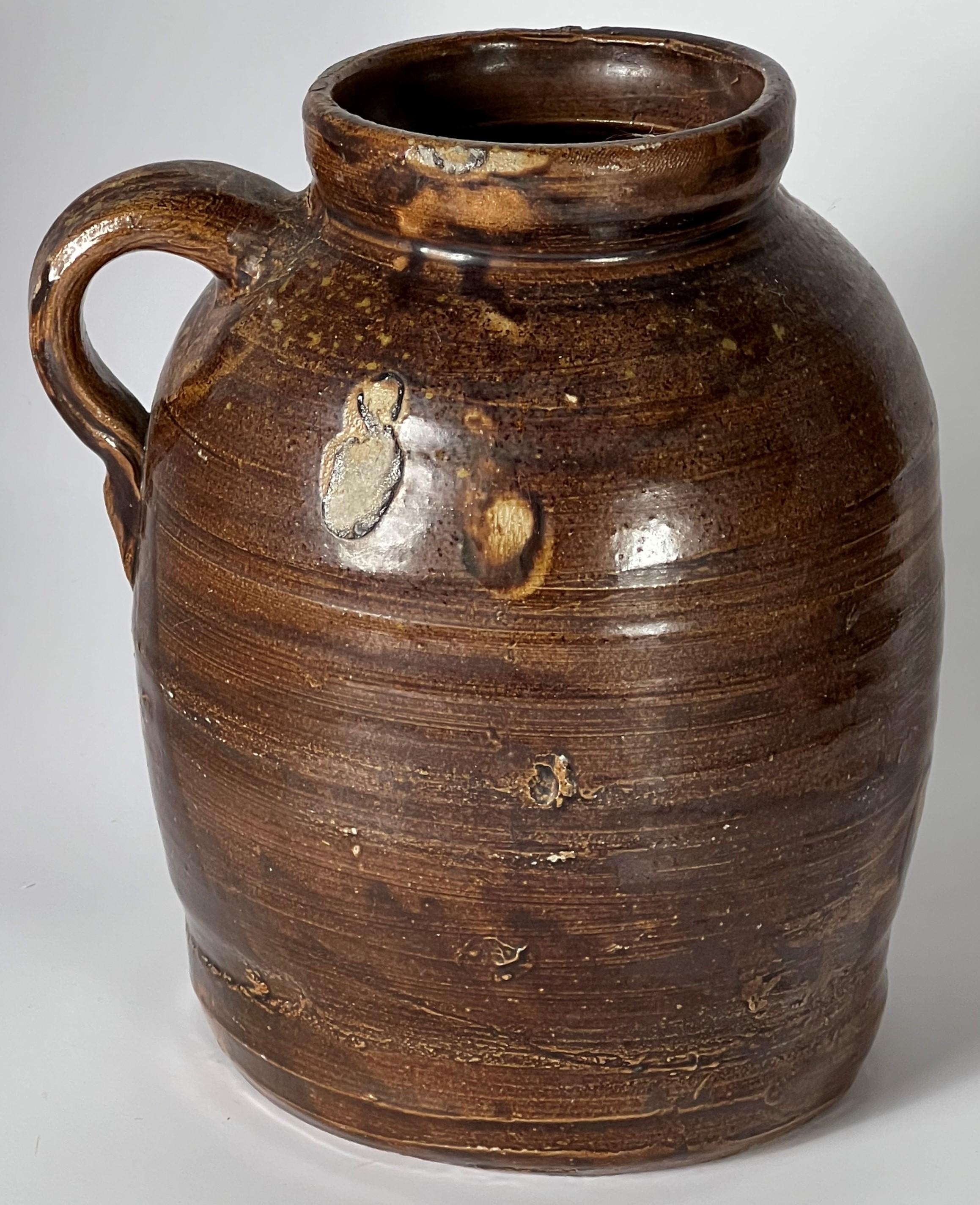 Sand Mountain Alabama pottery is well known, oft curated and infrequently available on the market. The variety of glazes, forms and makers is remarkable. Perhaps, the iconic form from Sand Mountain, the canning and/or preserve jars were a