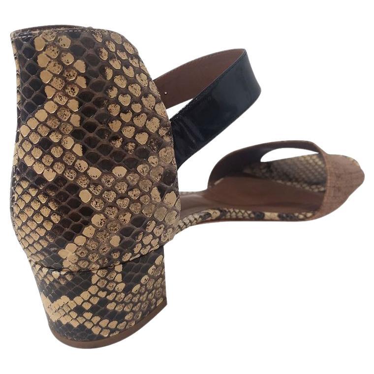 Reptile leather Camel color Black patent ankle strap Jute insert on the front part Heel high cm 45 (177 inches)
