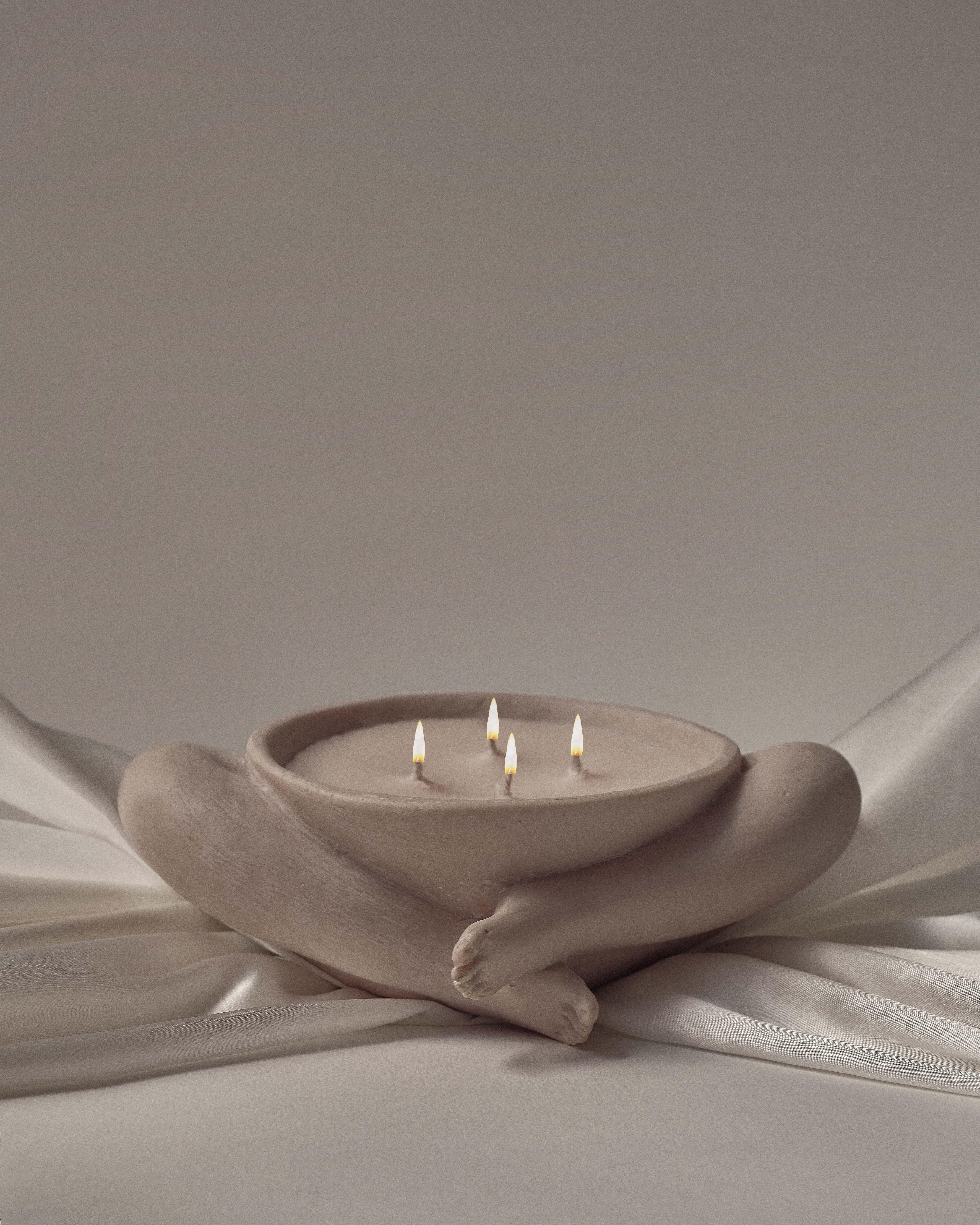 The Sandalwood Sculpture in ivory stone is a decorative, hand-sculpted object that doubles as a candle carrying notes of star anise, cedar leaf, sandalwood, amber, cedarwood and musk.

Each piece is carefully hand-sculpted in clay and later hand