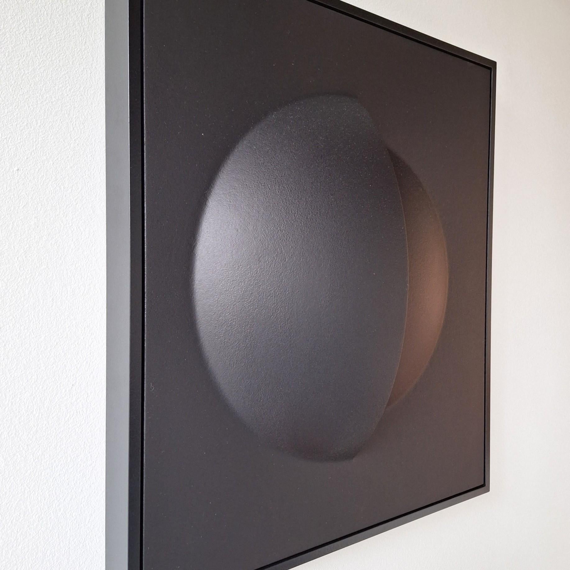 Nocturnal Parts is a unique one-of-a-kind contemporary modern painting relief by Dutch artist Sander Martijn Jonker. It is a relief consisting of two open spherical parts with an intriguing matte black finish, perhaps a bit mysterious but very