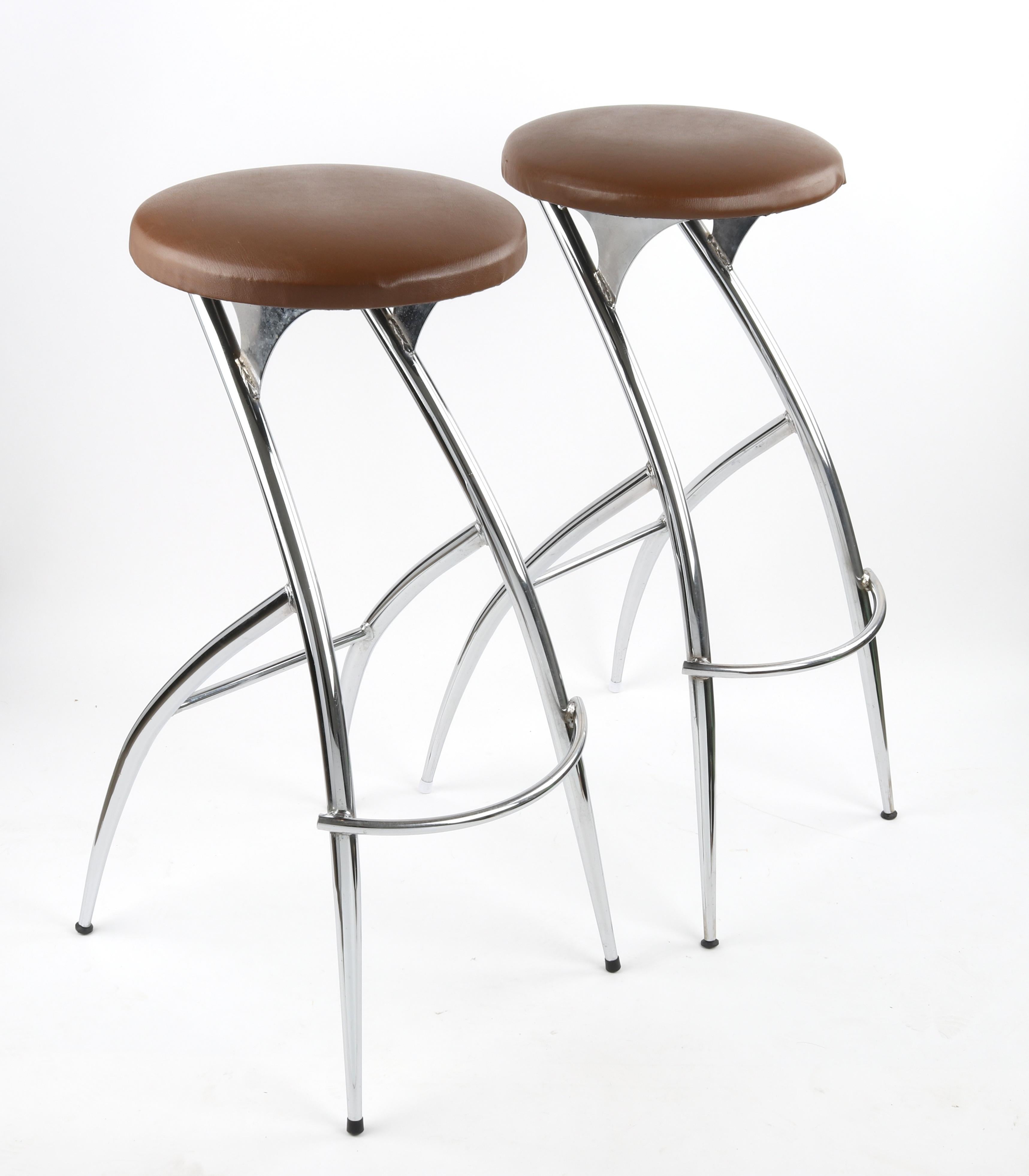 Rare Vintage Late 1980's Early 1990's Sandler Seating Chrome Upholstered Architectural Curved Bar Stools - Set of 2

A pair of beautifully designed bar stools likely designed for the upscale restaurant or hospitality sector. Circa late 1980s - early