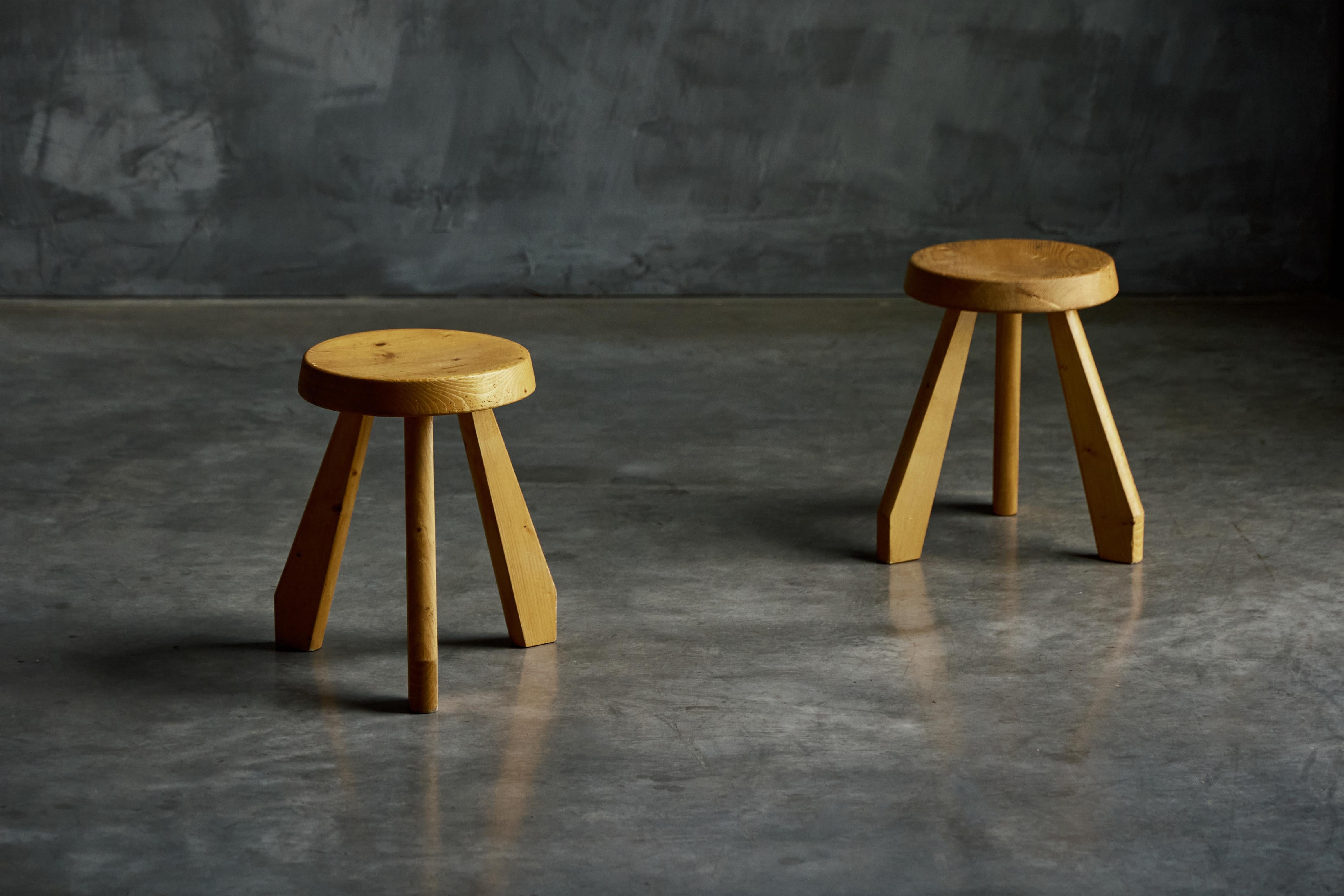 Sandoz stools by Charlotte Perriand originally designed in 1955 for Perriand's own chalet in Méribel and gained greater recognition when the visionary designer adapted the design for Sandoz Laboratories in 1962. These four-legged pine stools embody