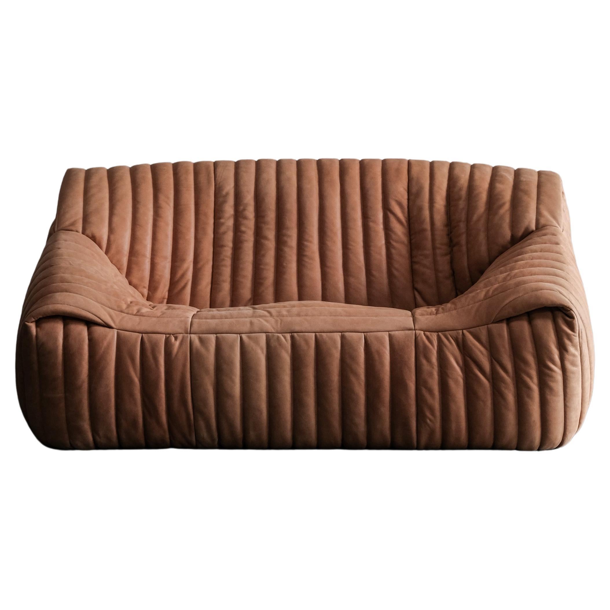 Sandra 2 seater sofa by Annie Hieronimus for Cinna in cognac leather