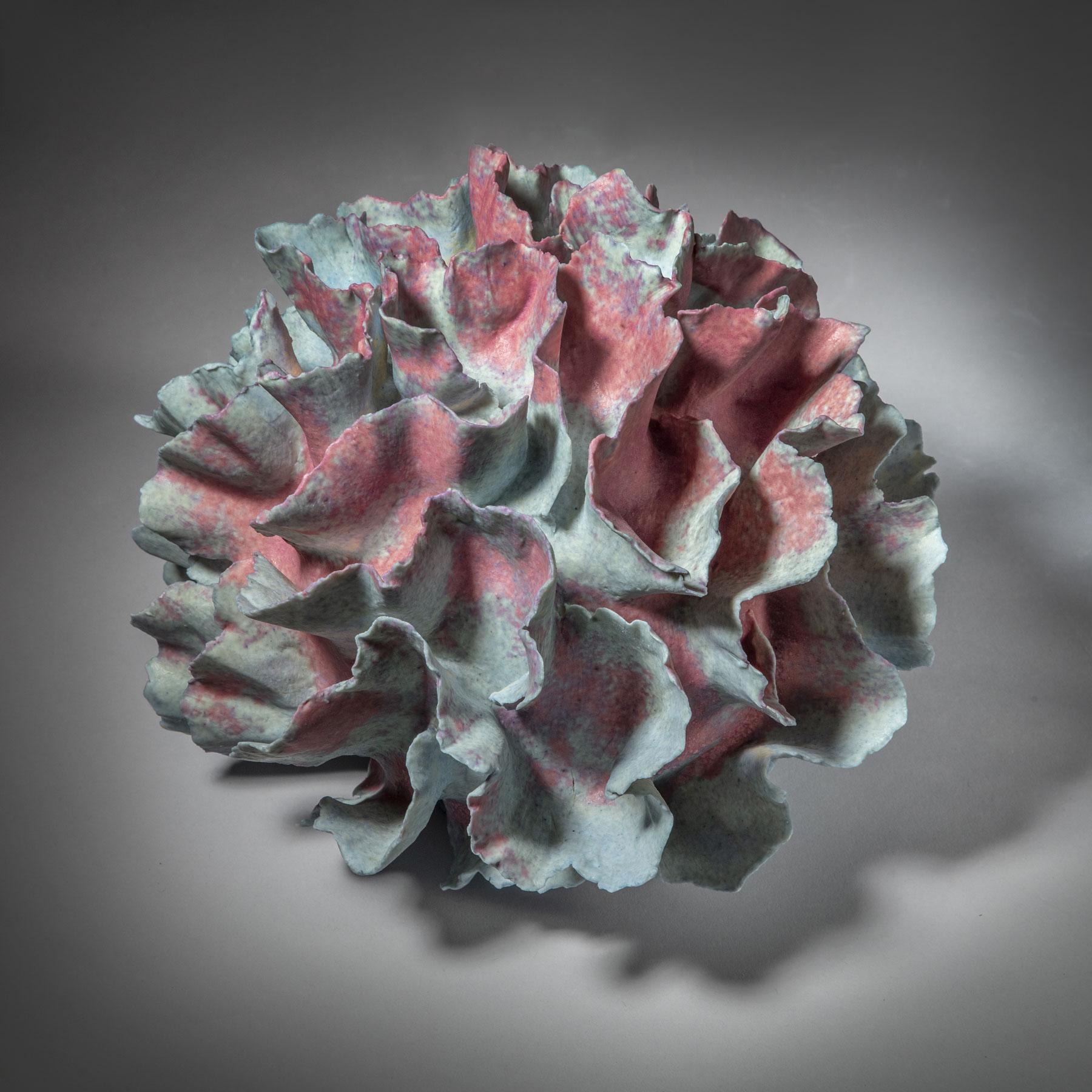 Davolio’s sculptural vessels are inspired by her deep connection to nature, and in particular, to the sea and its magnificent coral reefs. A symphony among craft, design, and art, these handmade objects evoke lightness, complexity, and an