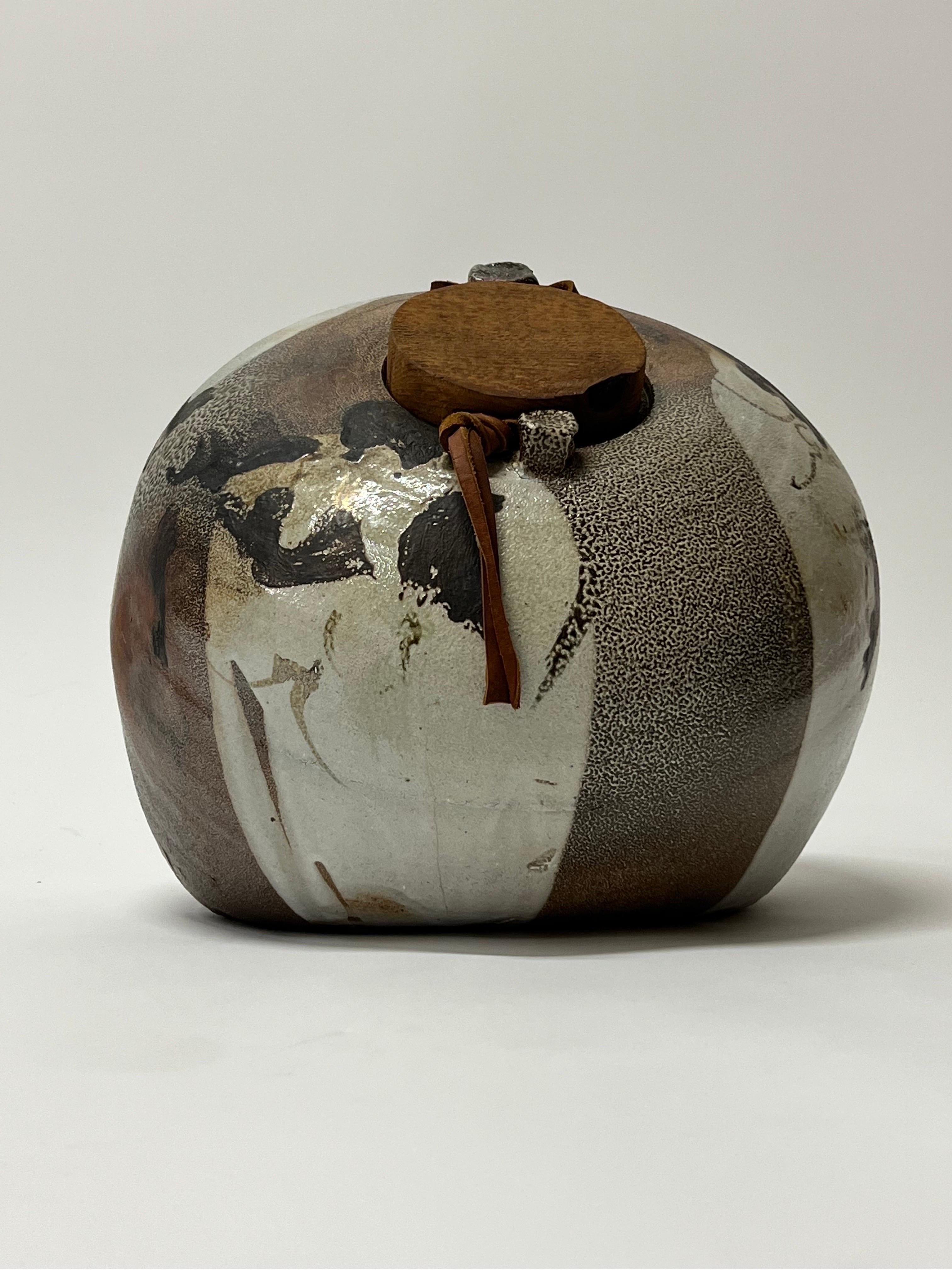 Amazing large lidded vessel by well listed potter, Sandra Johnstone c1970s. Johnstone (1936-1991) studied with Peter Voulkos at UC Berkeley in the 1950s. In addition Johnstone also studied with Paul Soldner. She eventually went on to build her own
