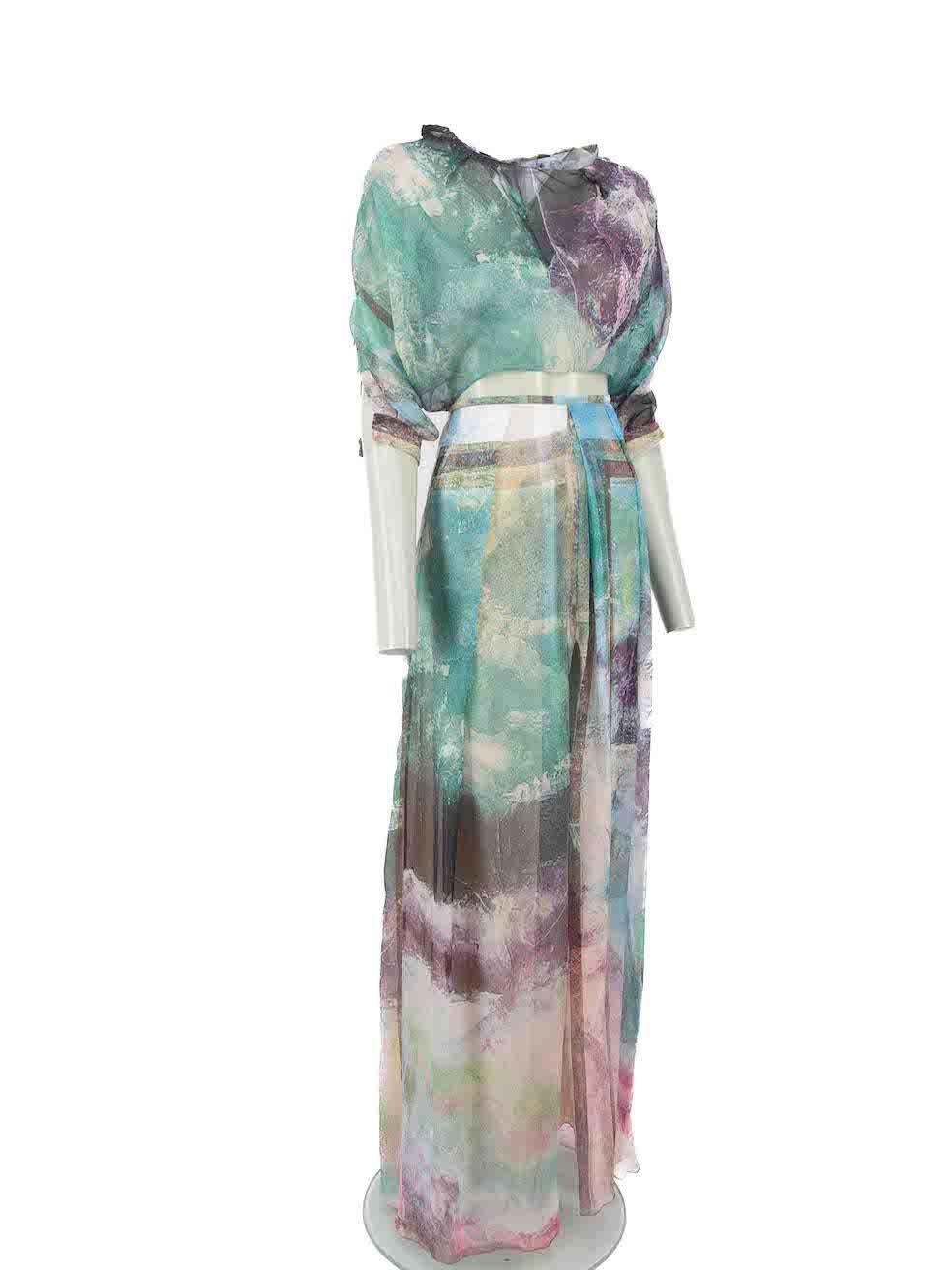 CONDITION is Very good. Minimal wear to set is evident. Minimal wear to top back neck and front neckline with small stitching holes on this used Sandra Mansour designer resale item.
 
Details
Multicolour
Silk
Top and skirt set
Abstract painting