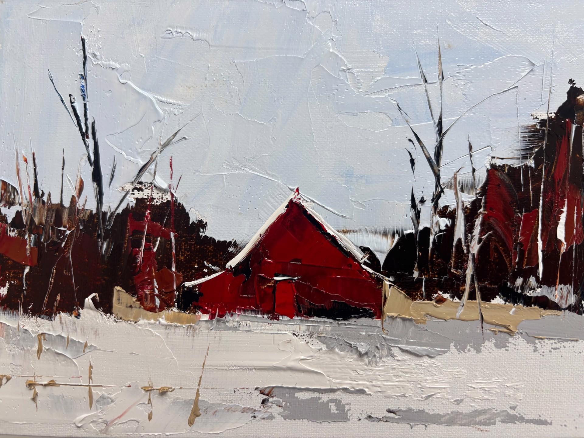 "Winter Refuge," 2025 is a mixed media painting by Sandra Pratt. The composition centers on a red barn situated in a snowy landscape, surrounded by leafless trees. The sky is rendered in pale blue and white tones, while the ground is covered with