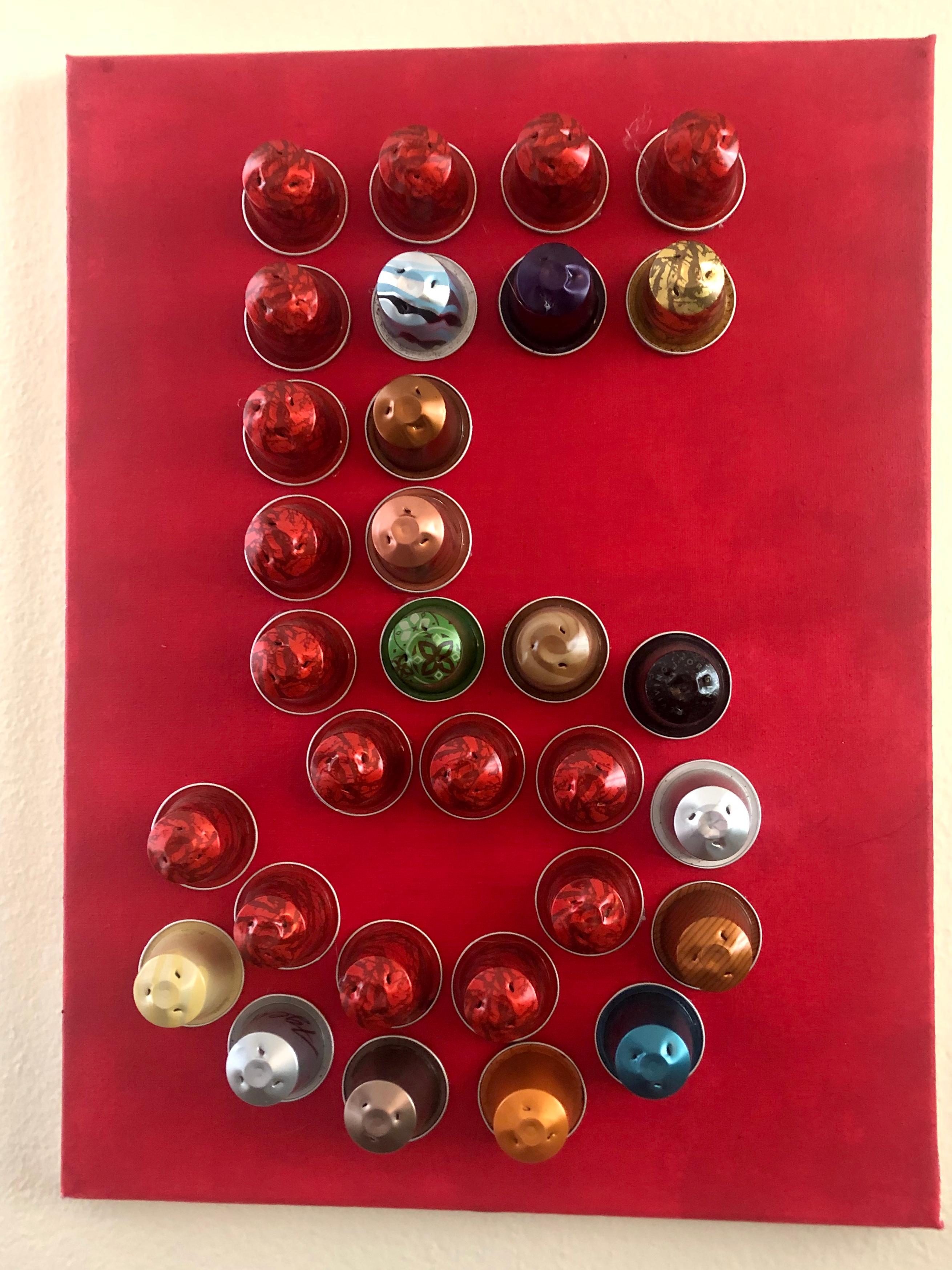 The picture is a part of the cycle RECYCLED, done during the pandemic and remembering all of us about the fragility of life. The material is acrylic on canvas and used Nespresso capsules. The number 