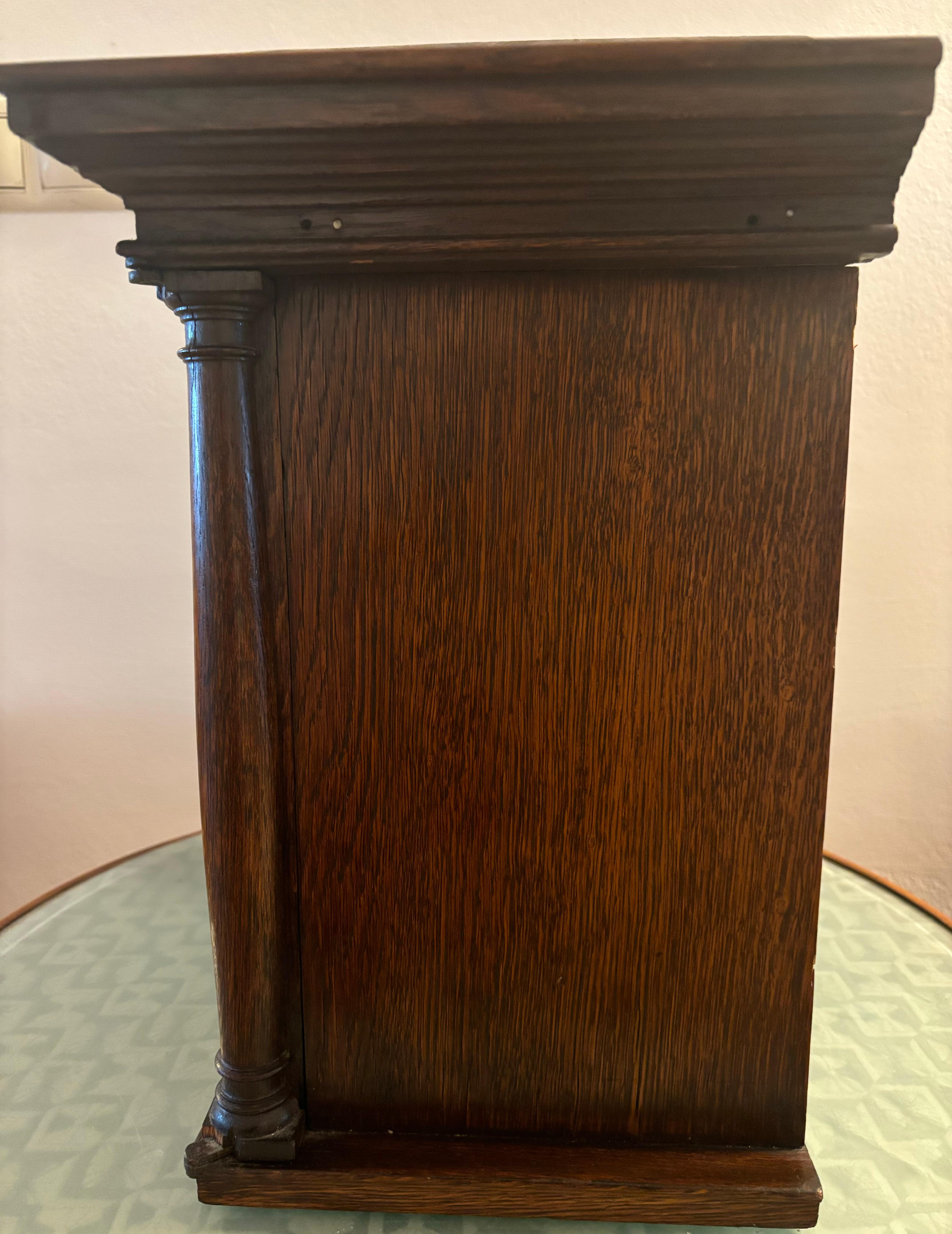 The object is a part of a furniture, glass door opening a little bit difficult to close, due to the age. Wood in good shape, probably end of 19th Century or early 20th Century. This inspired me for a piece of art called Gate. I used paper and wood