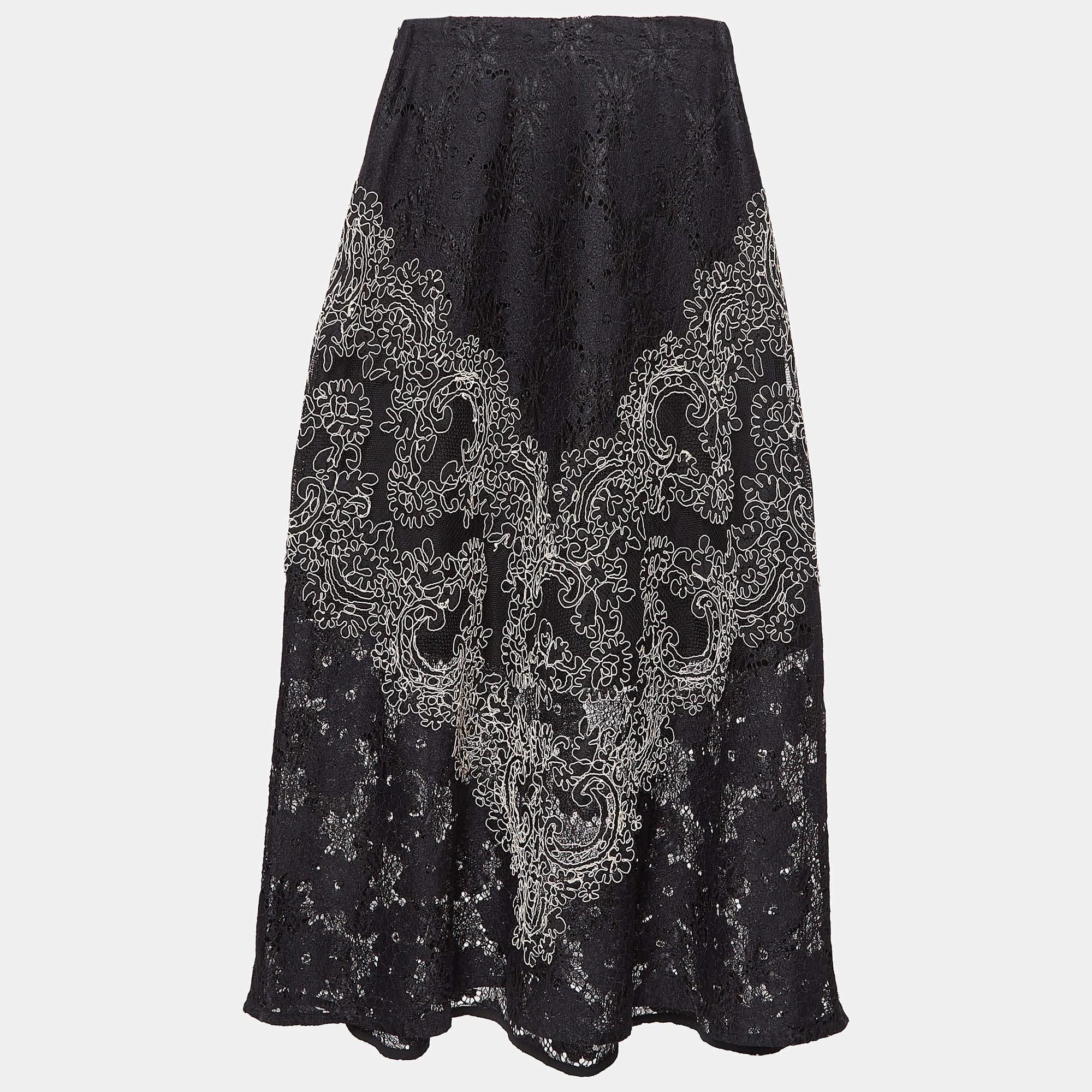 This lovely skirt is beautifully stitched from fine fabric. The comfy designer skirt has a flattering silhouette. Pair it with a simple top and strappy heels for a chic look.