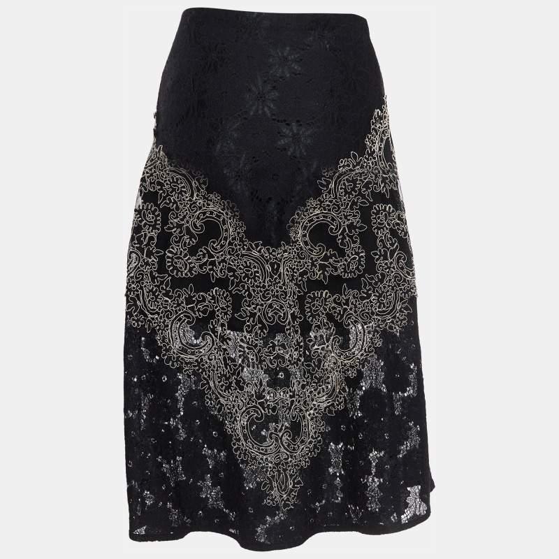 This elegant skirt is worth adding to your closet Crafted from fine materials it is exquisitely designed into a flattering shape.