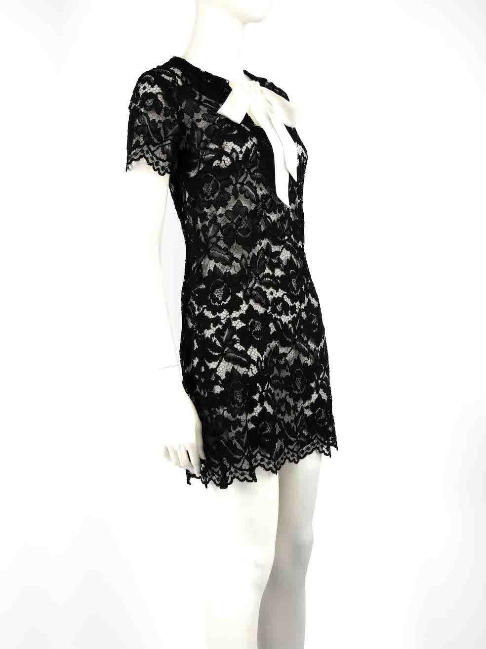 CONDITION is Good. Minor wear to dress is evident. Light wear to the lace with slight unravelling at the front and there is a small mark on the neck tie on this used Sandro designer resale item.
 
 
 
 Details
 
 
 Black
 
 Lace
 
 Dress
 
 See