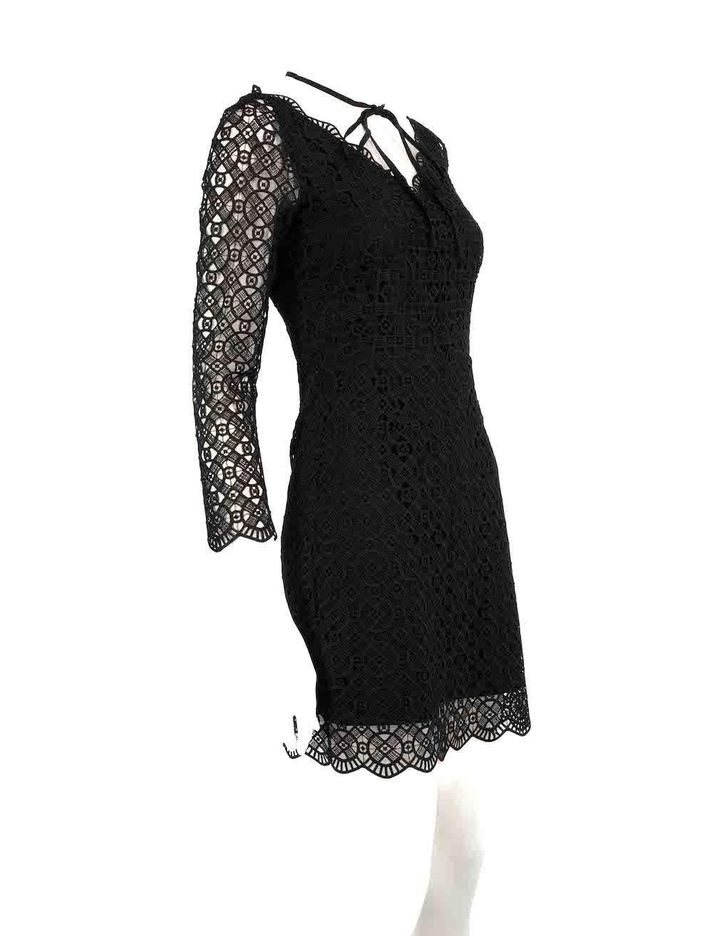 CONDITION is Very good. Minimal wear to dress is evident. Minimal wear to the rear neckline lining with slight discolouration on this used Sandro designer resale item.
 
 
 
 Details
 
 
 Black
 
 Lace
 
 Dress
 
 Mini
 
 Long sheer sleeves
 
 White