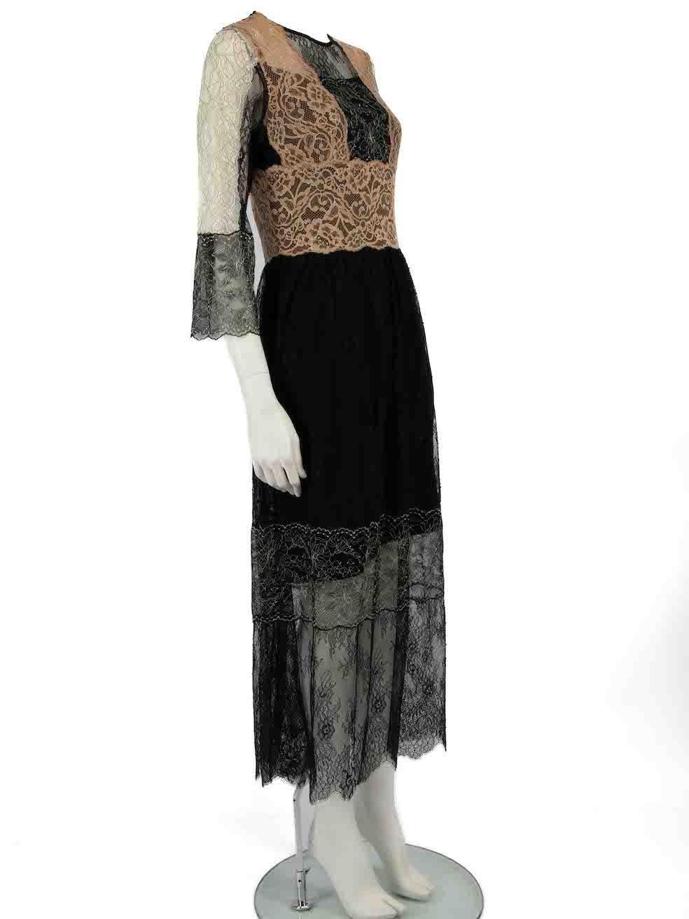 CONDITION is Very good. Hardly any visible wear to dress is evident on this used Sandro designer resale item.
 
 
 
 Details
 
 
 Black
 
 Lace
 
 Dress
 
 Long sleeves
 
 Midi
 
 Round neck
 
 Panelled
 
 Sheer
 
 Back zip fastening
 
 Comes with