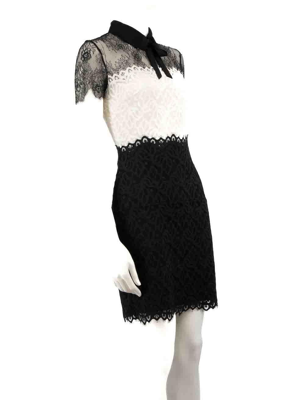 CONDITION is Very good. Minimal wear to dress is evident. Minimal wear to the front of the dress with a small mark near the centre on this used Sandro designer resale item.
 
 
 
 Details
 
 
 Black
 
 Lace
 
 Dress
 
 Mini
 
 Short sleeves
 
 Sheer