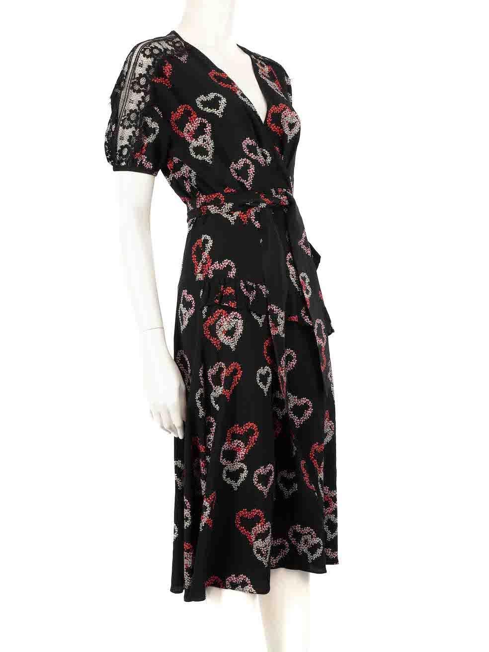 CONDITION is Very good. Hardly any visible wear to the dress is evident on this used Sandro designer resale item.
 
 
 
 Details
 
 
 Black
 
 Silk
 
 Dress
 
 Floral heart print
 
 Midi
 
 Short sleeves
 
 Lace panel sleeves
 
 Waist tie fastening
