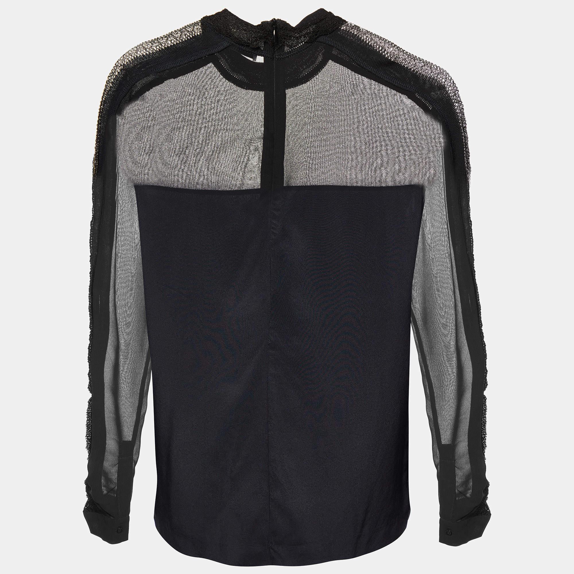 Careful tailoring  quality materials  and elegant cuts make this designer top a piece to cherish It comes in a classic design to be easy to style.