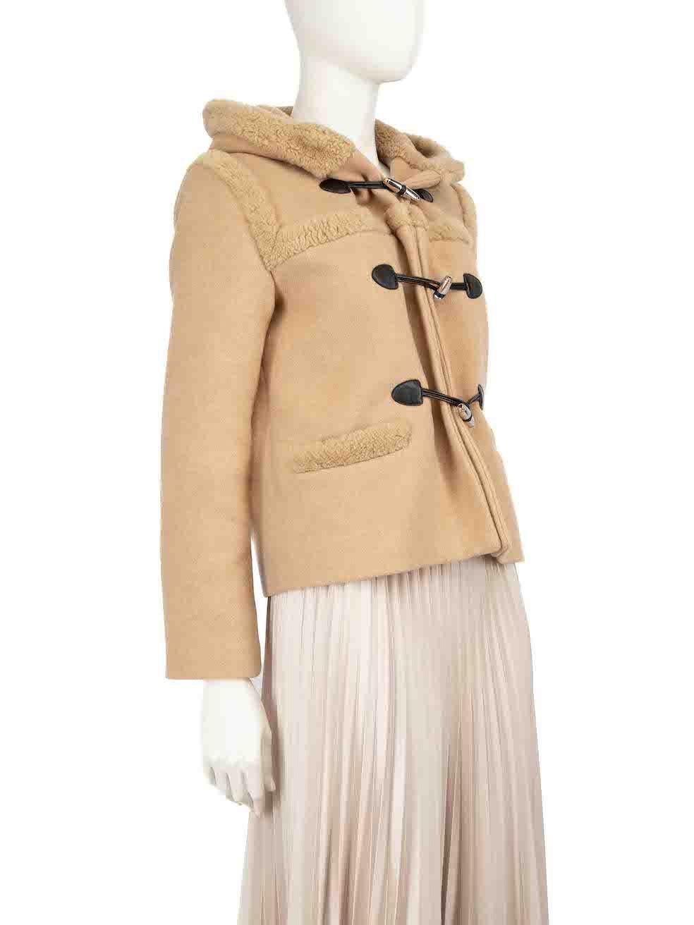 CONDITION is Good. Minor wear to coat is evident. Light pilling to the hemline and small abrasion to the right sleeve. Discolouration to the lining and internal bust area on this used Sandro designer resale item.
 
 
 
 Details
 
 
 Camel
 
 Wool
 
